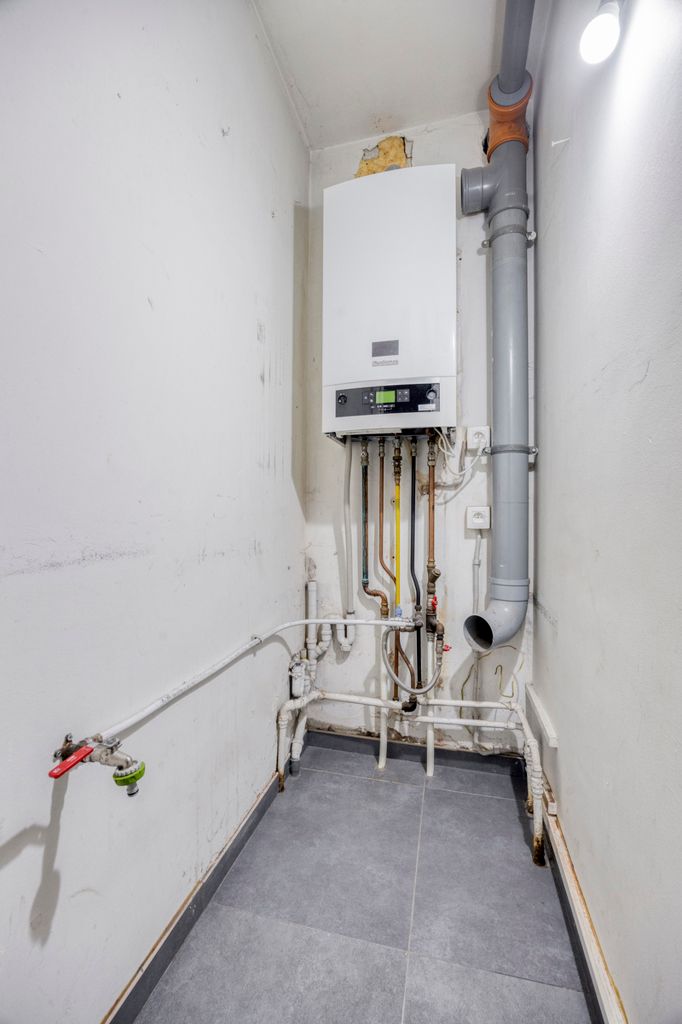 Instapklaar gelijkvloers appartement met eigen tuin foto 15