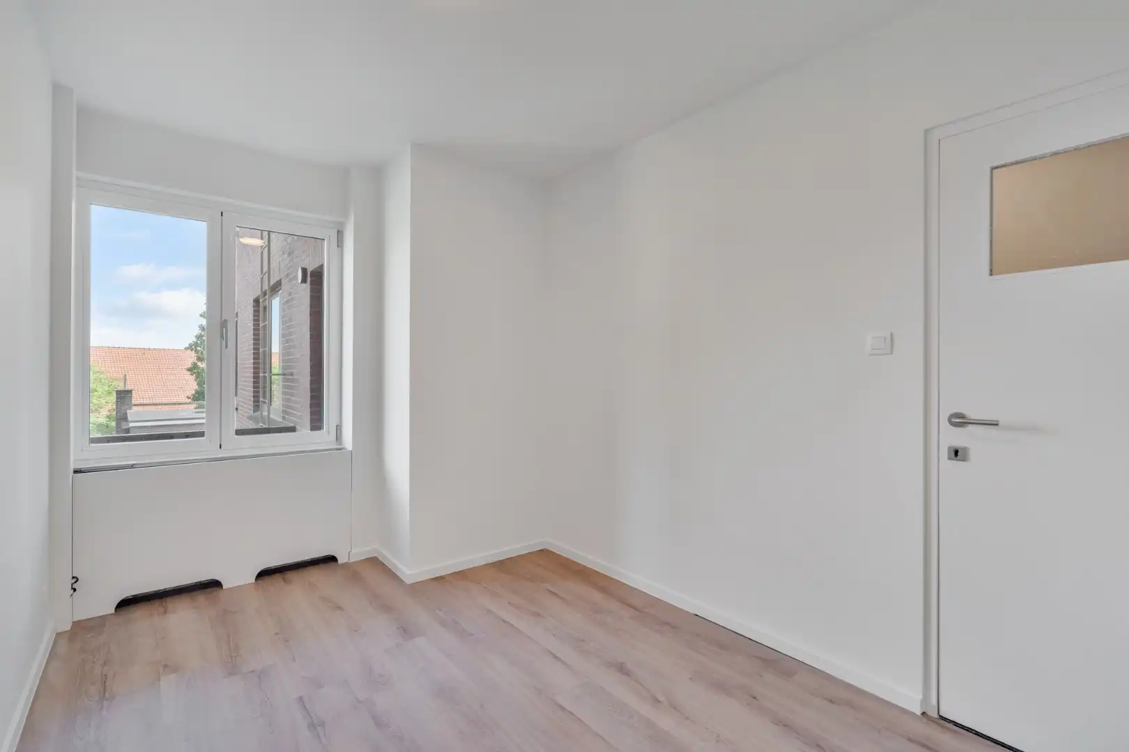 Stijlvol gerenoveerd appartement met moderne uitstraling in het centrum van Maaseik!  foto 25