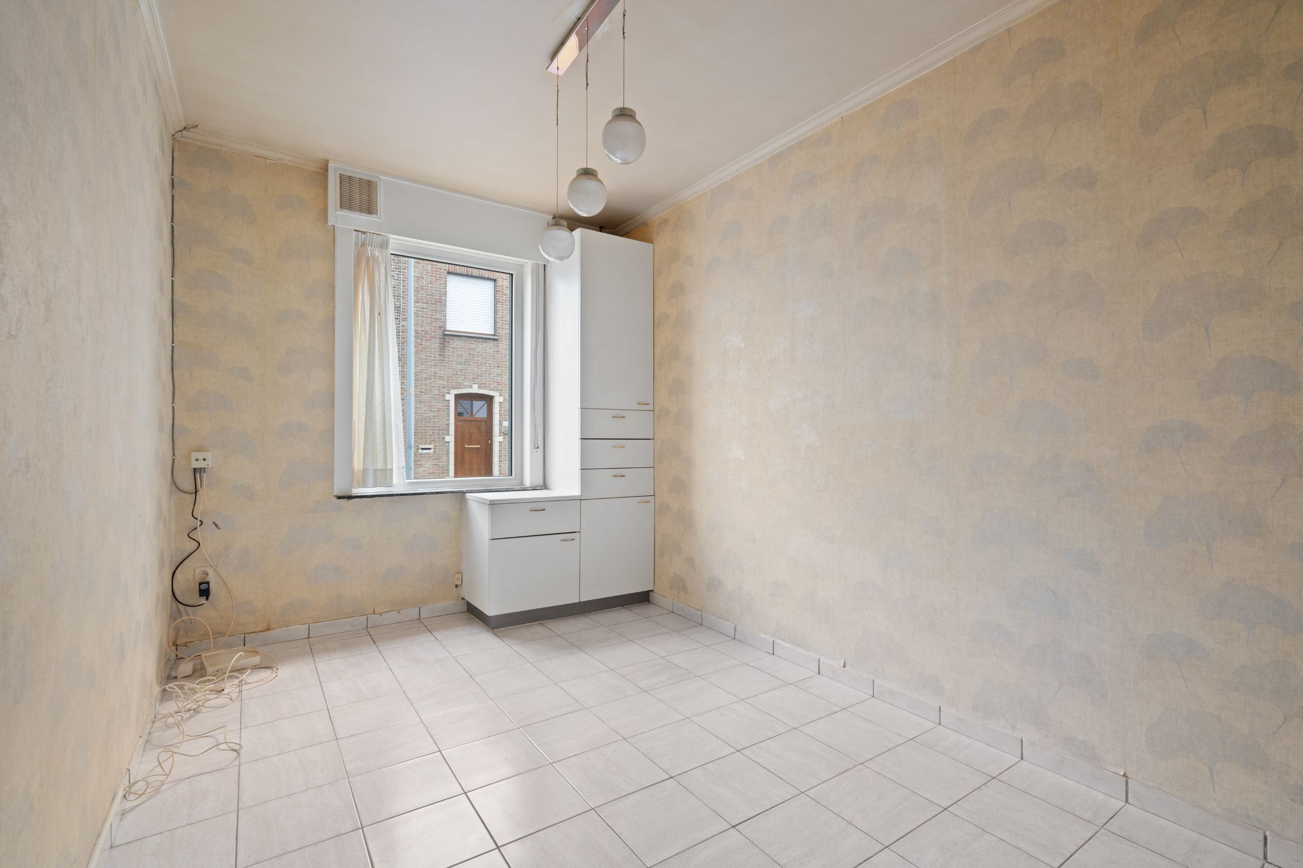 Te renoveren rijwoning in centrum Harelbeke foto 10