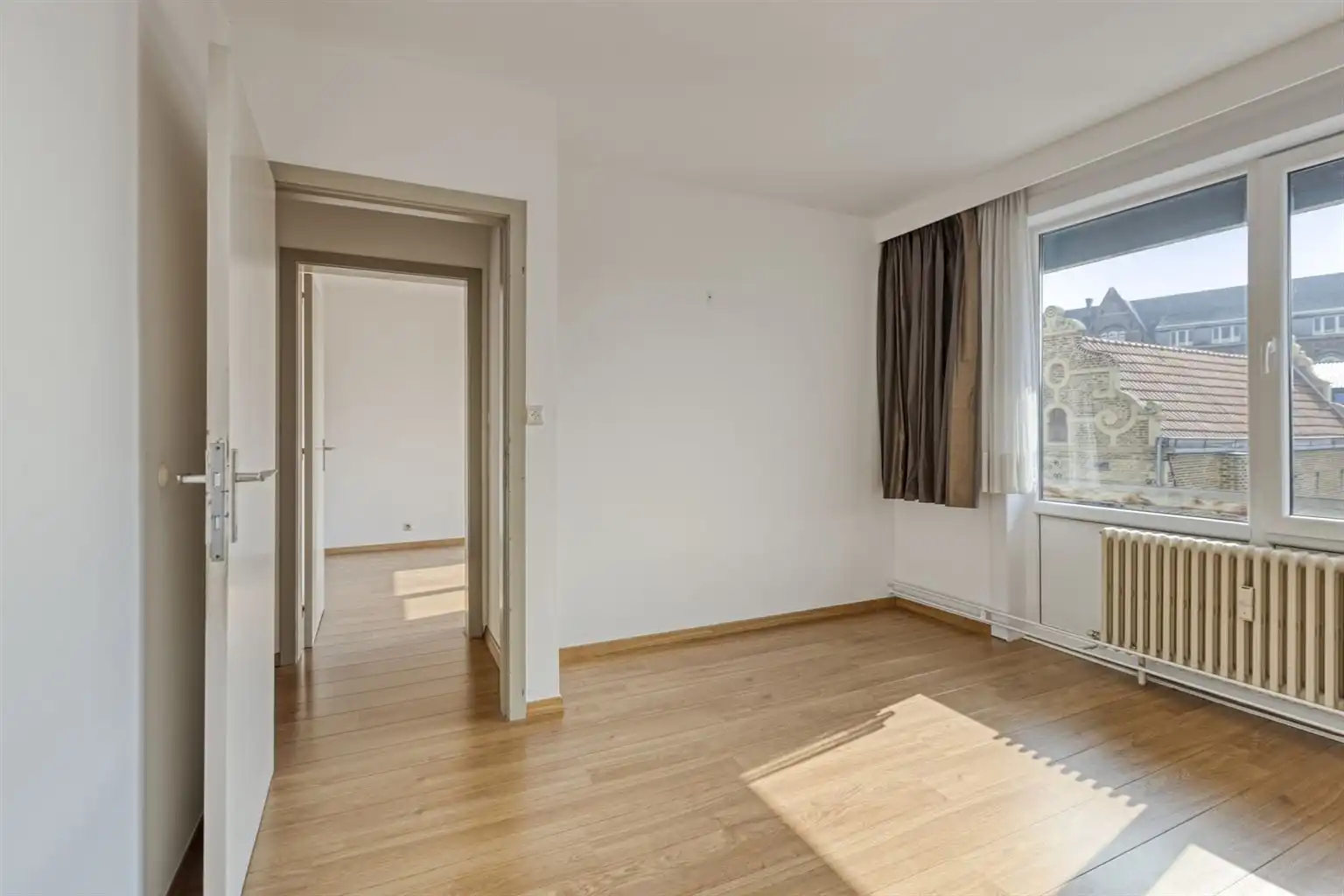 Prachtig ruim appartement met 3 slaapkamers en autostaanplaats gelegen in het hart van Maaseik.  foto 12