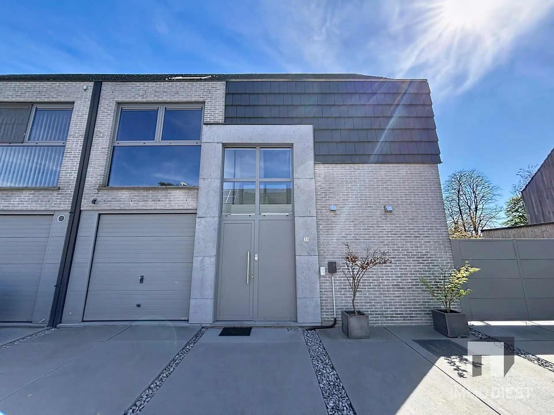 Hip wonen in alle rust: energiezuinige split-levelwoning in Zoerle-Parwijs. foto {{pictureIndex}}