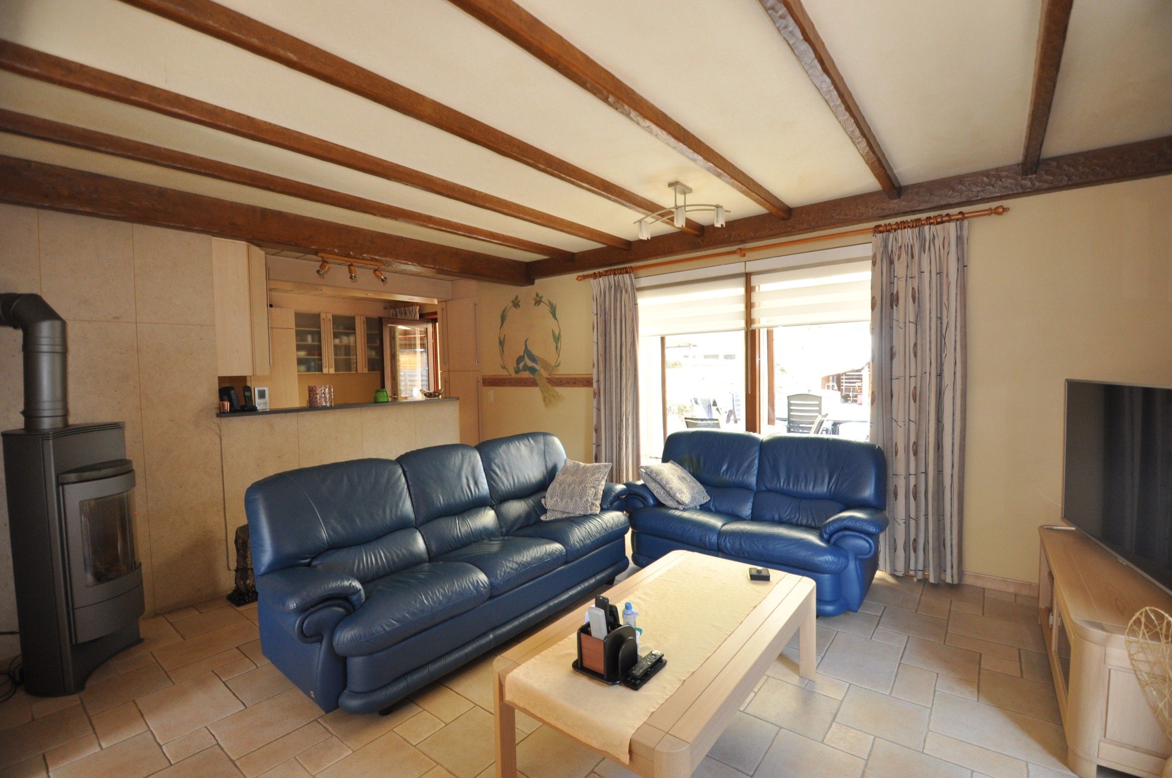 Ruime verzorgde woning met grote tuin en garage ! foto 8