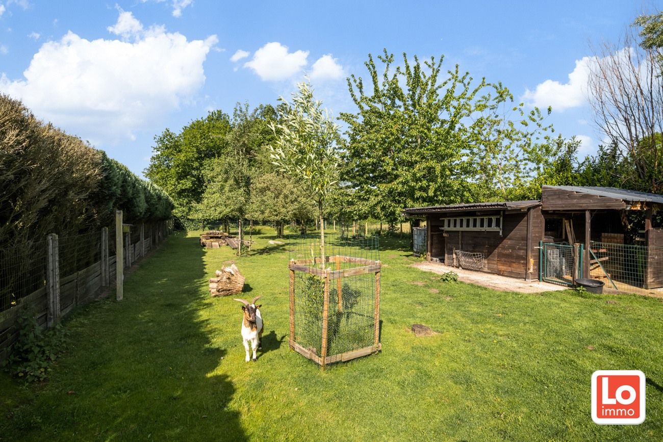 VERKOCHT!! Landelijk gelegen charmante en gezellige open bebouwing met grote tuin tussen het centrum van Laarne en Heusden. foto 3