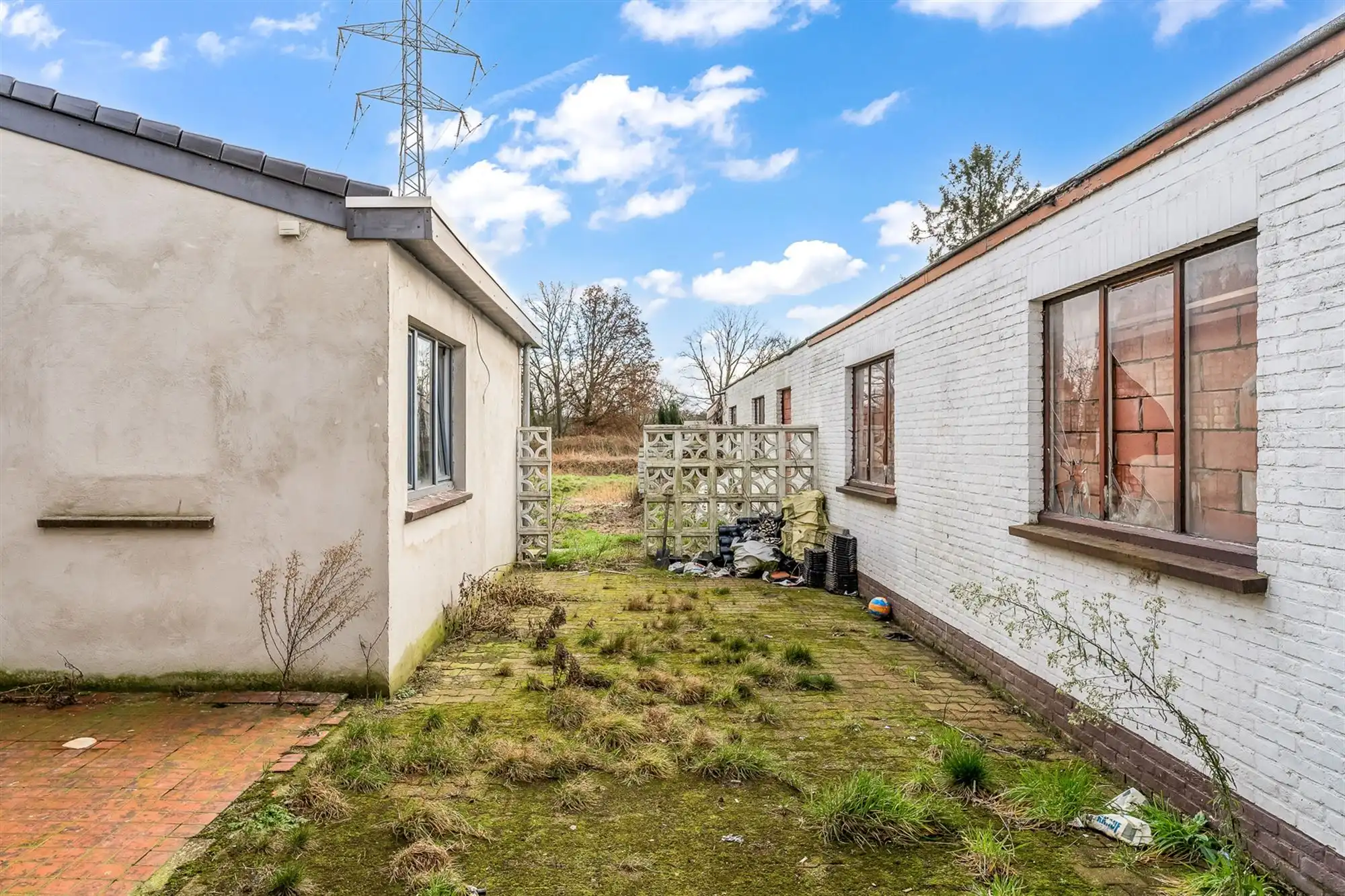 HANDELSHUIS MET RUIM HANDELSPAND EN 2 WOONENTITEITEN OP PERCEEL VAN 9A68CA TE KOERSEL foto 42