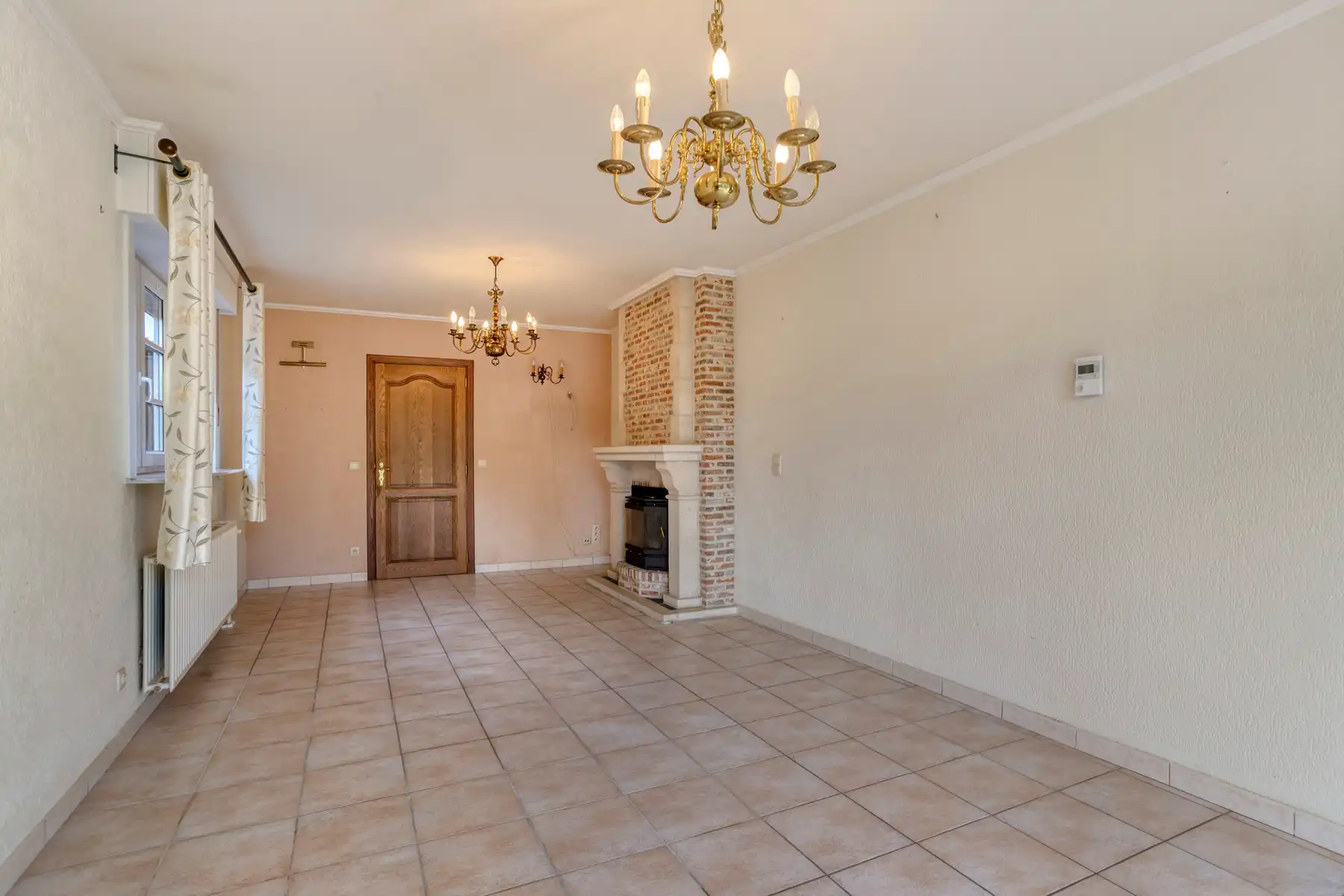 Half open bebouwing met 3 slaapkamers, garage en ruime tuin! foto 4