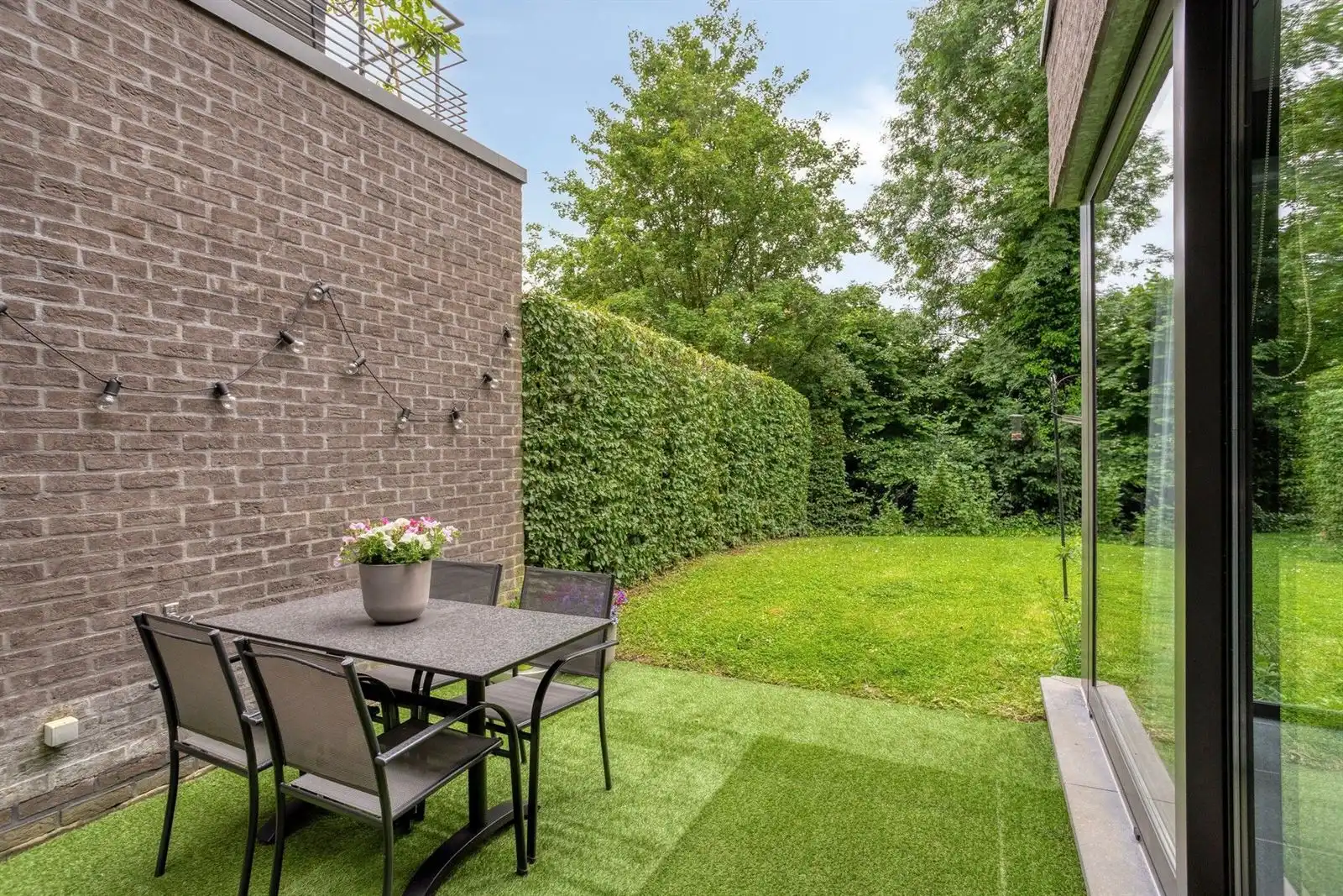 Gelijkvloers appartement met 2 slaapkamers en tuin, kelder & staanplaats foto 22