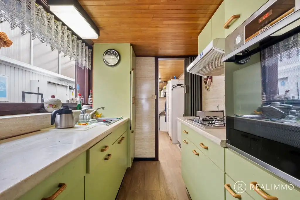 Te renoveren gezinswoning met uitweg en garage in Avelgem foto 4