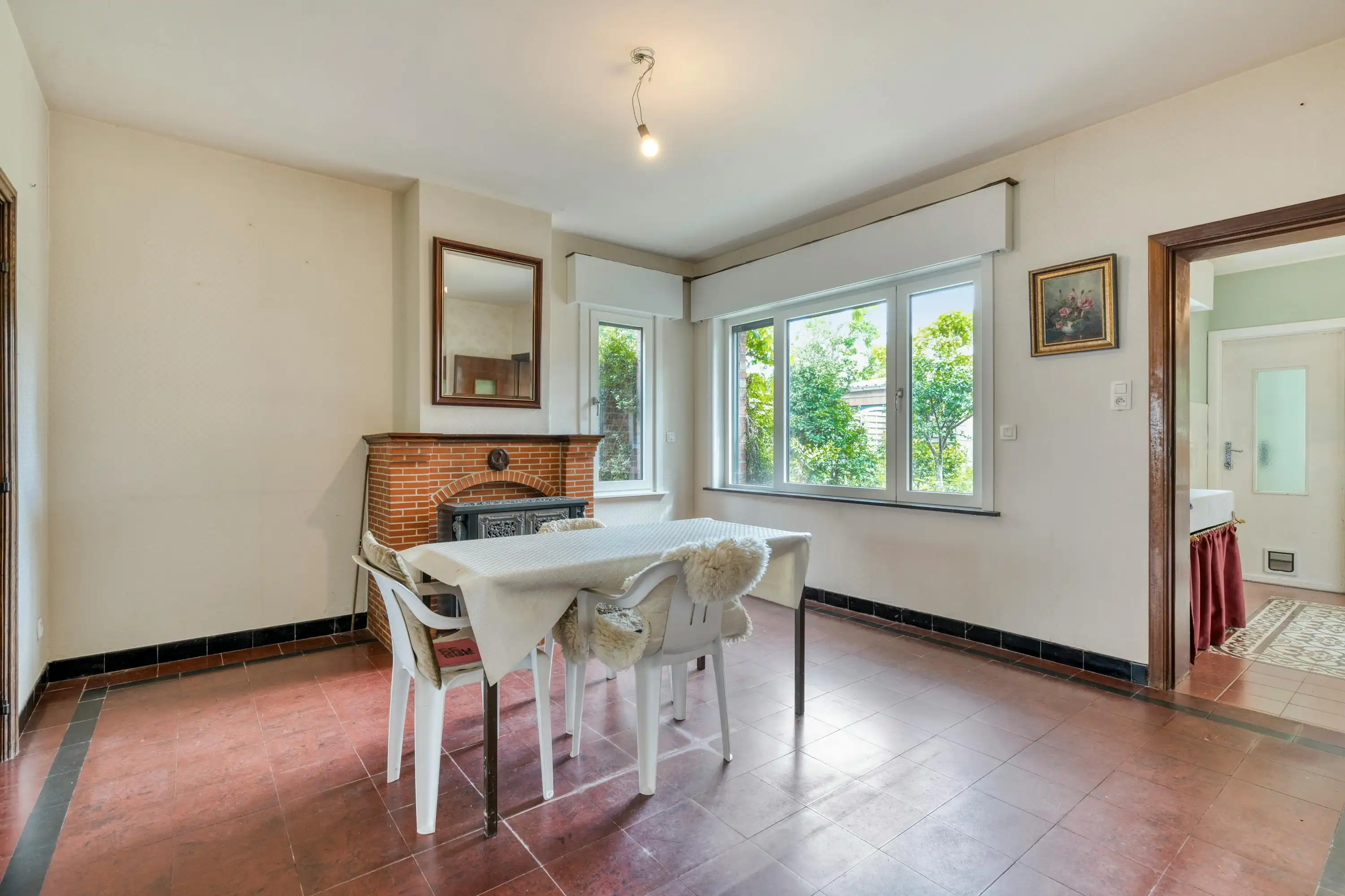 Halfopen huis met 3 slaapkamers, carport + tuin te Sint-Kruis foto 5