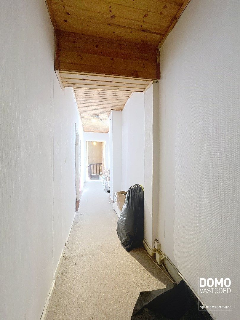 RUIME TE RENOVEREN WONING MET 5 SLAAPKAMERS EN RUIME ACHTERLIGGENDE GARAGE TE BILZEN-HOESELT foto 11