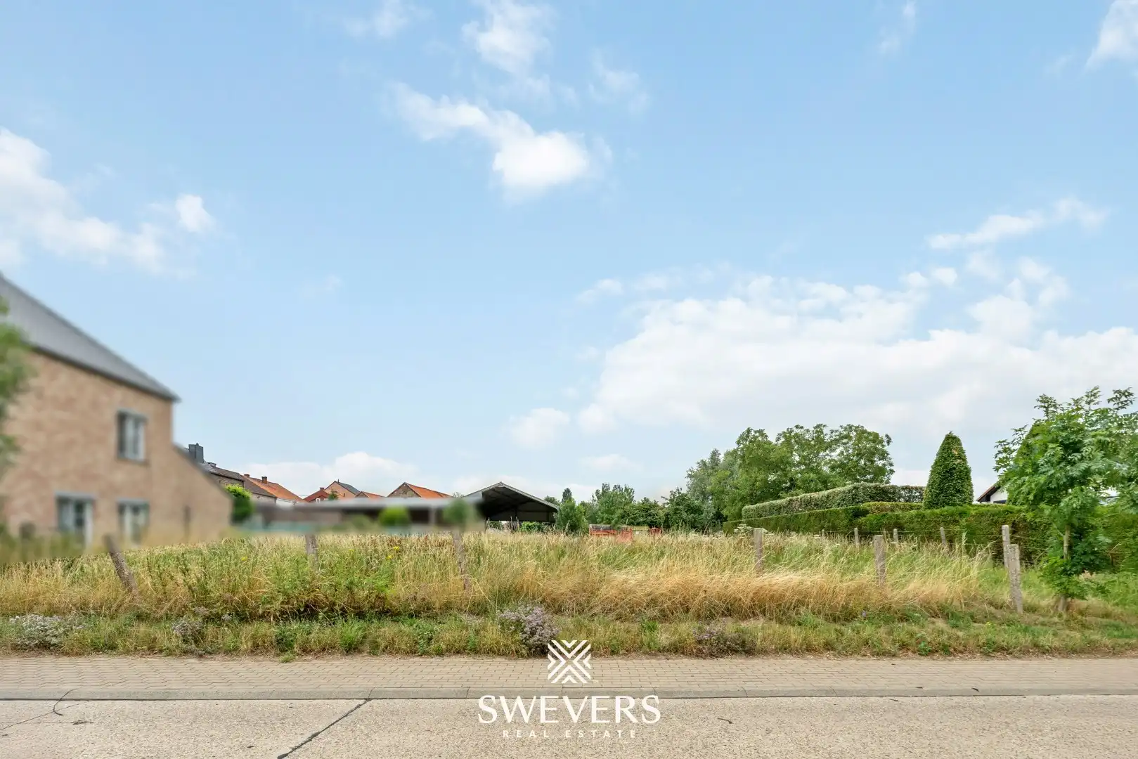 Bouwgrond voor halfopen bebouwing in hartje Riemst foto 12