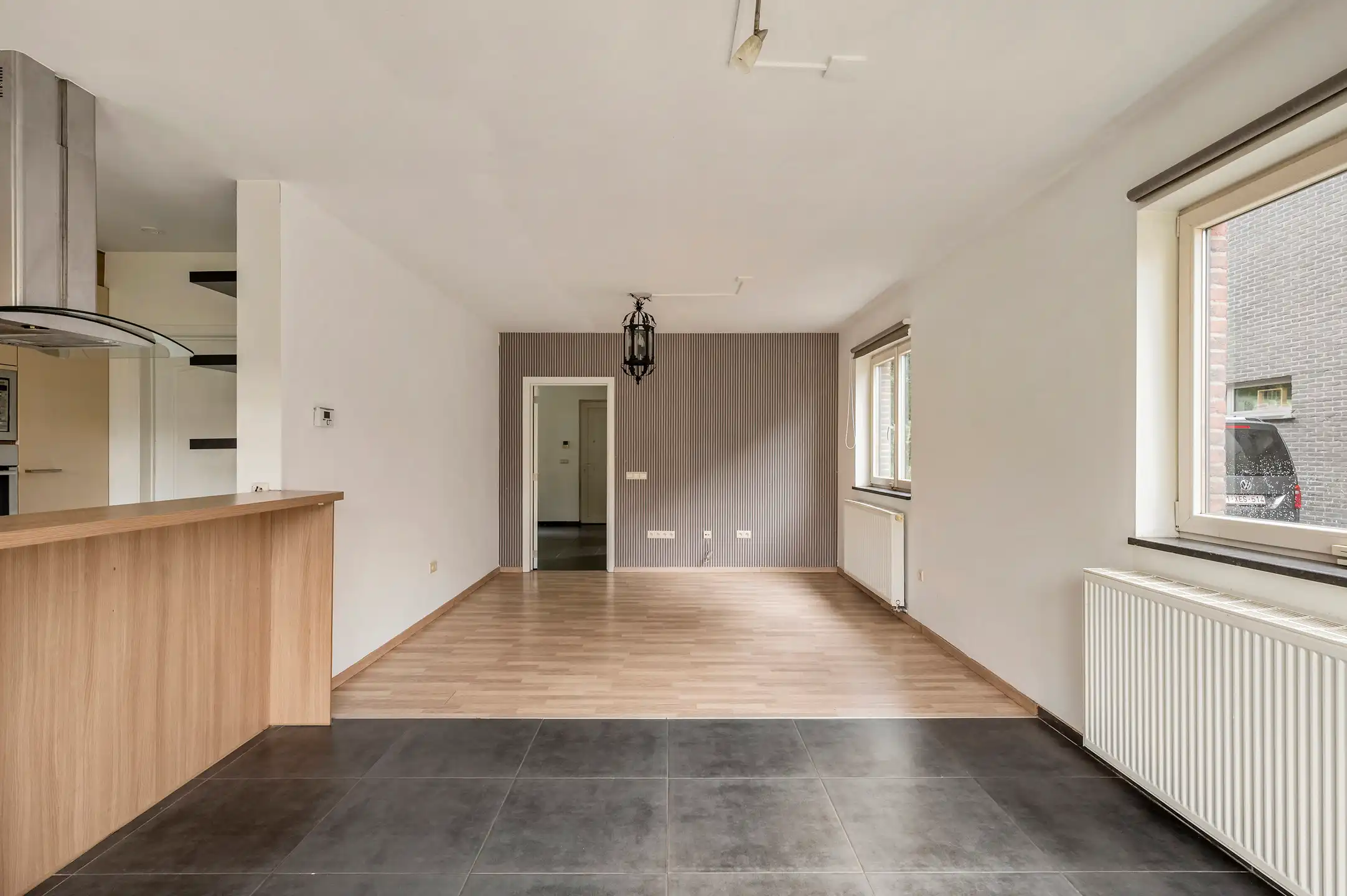 Ruime en lichtrijke gezinswoning met 3 slaapkamers, dressing bureau en aangename tuin foto 10