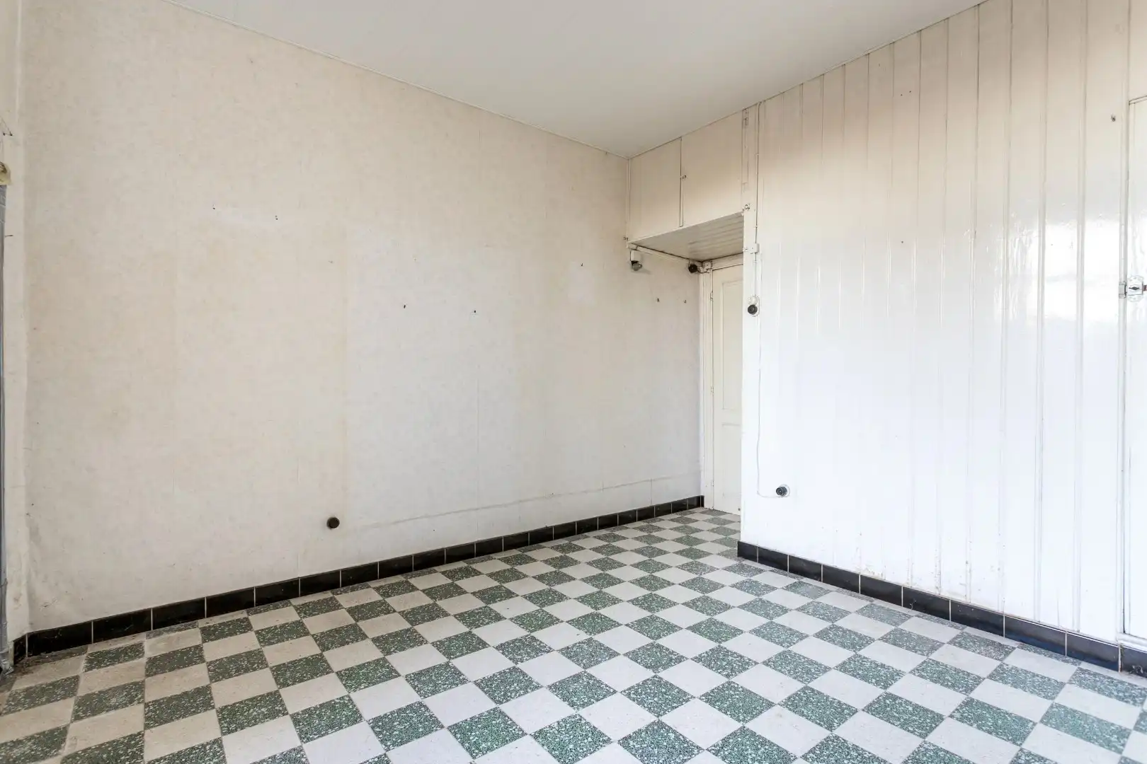 Te renoveren rijwoning met tuin te Vlezenbeek foto 6