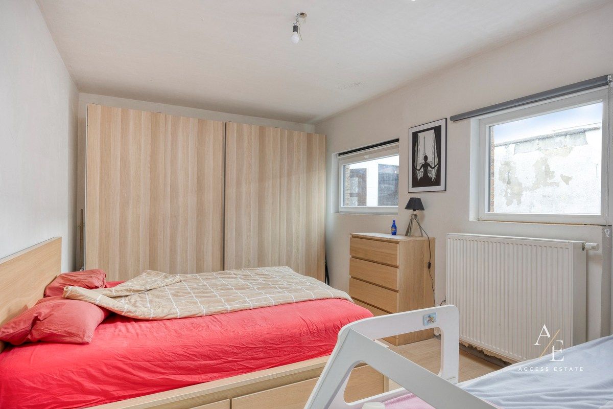Ruime halfopen woning met potentieel in rustige straat te Melle foto 9