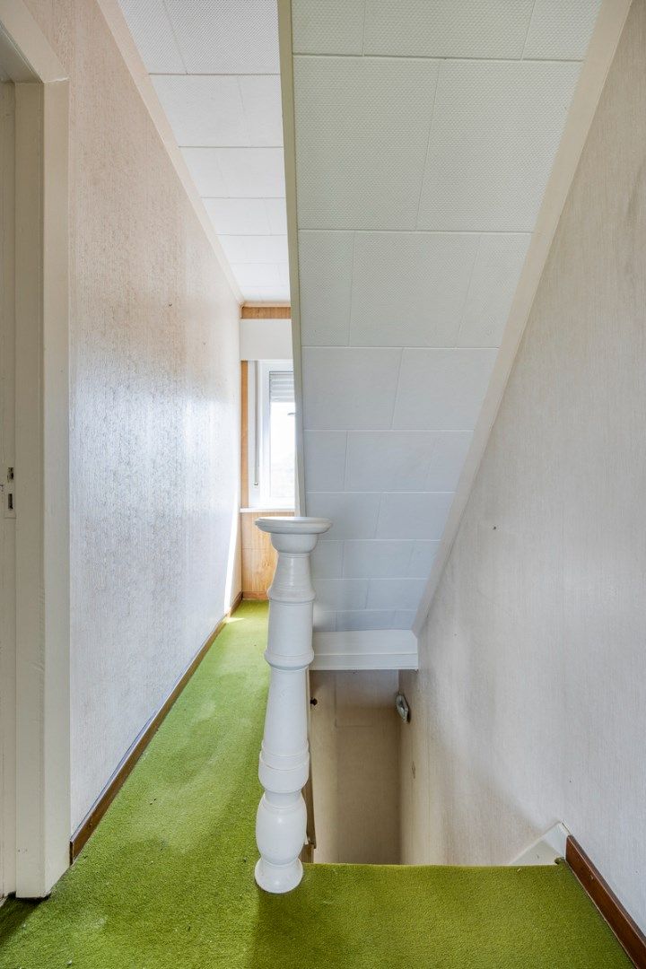 Ruim ingedeelde woning met 3slpks op een gunstige ligging. foto 14