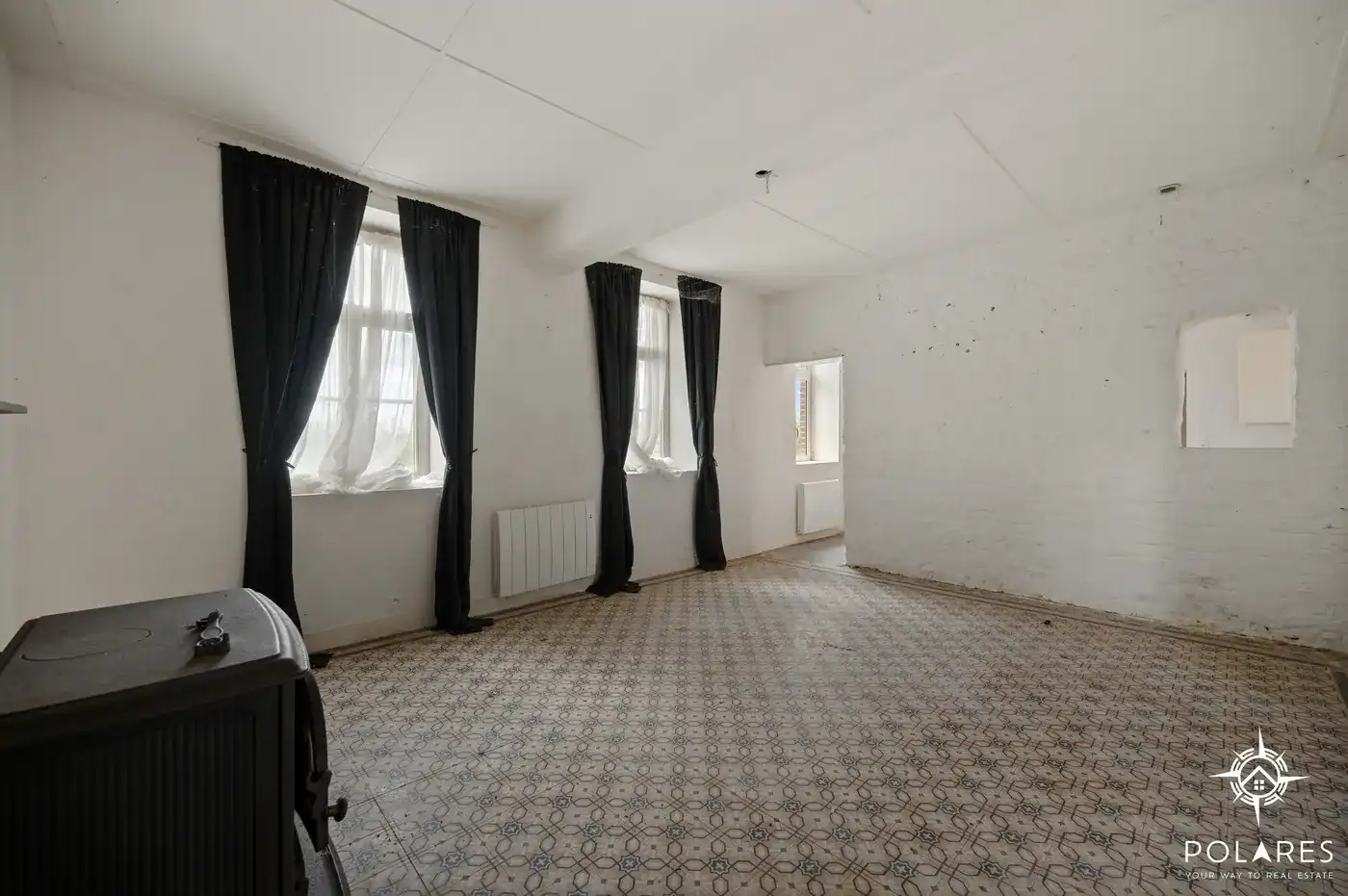 Te renoveren woning met ruime tuin en tal van mogelijkheden in Glabbeek foto 4