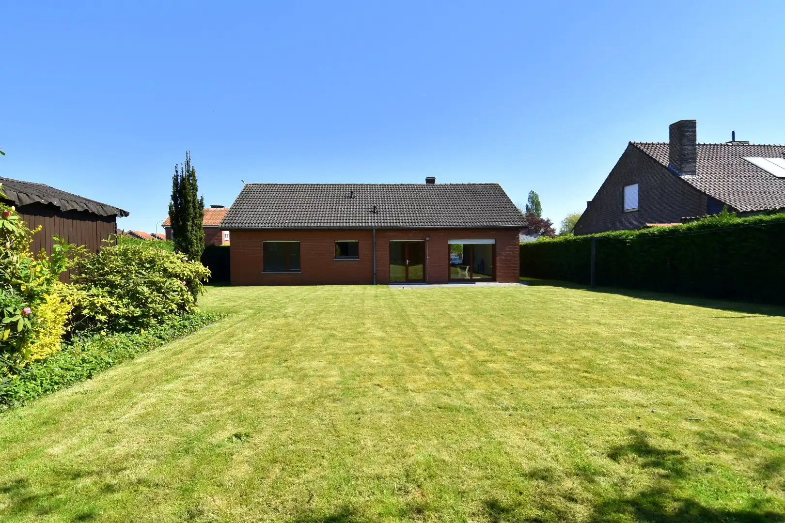 Ruime alleenstaande woning met 2 slaapkamers (mogelijkheid tot meer!), garage en zonnige tuin te koop in Gullegem foto 4