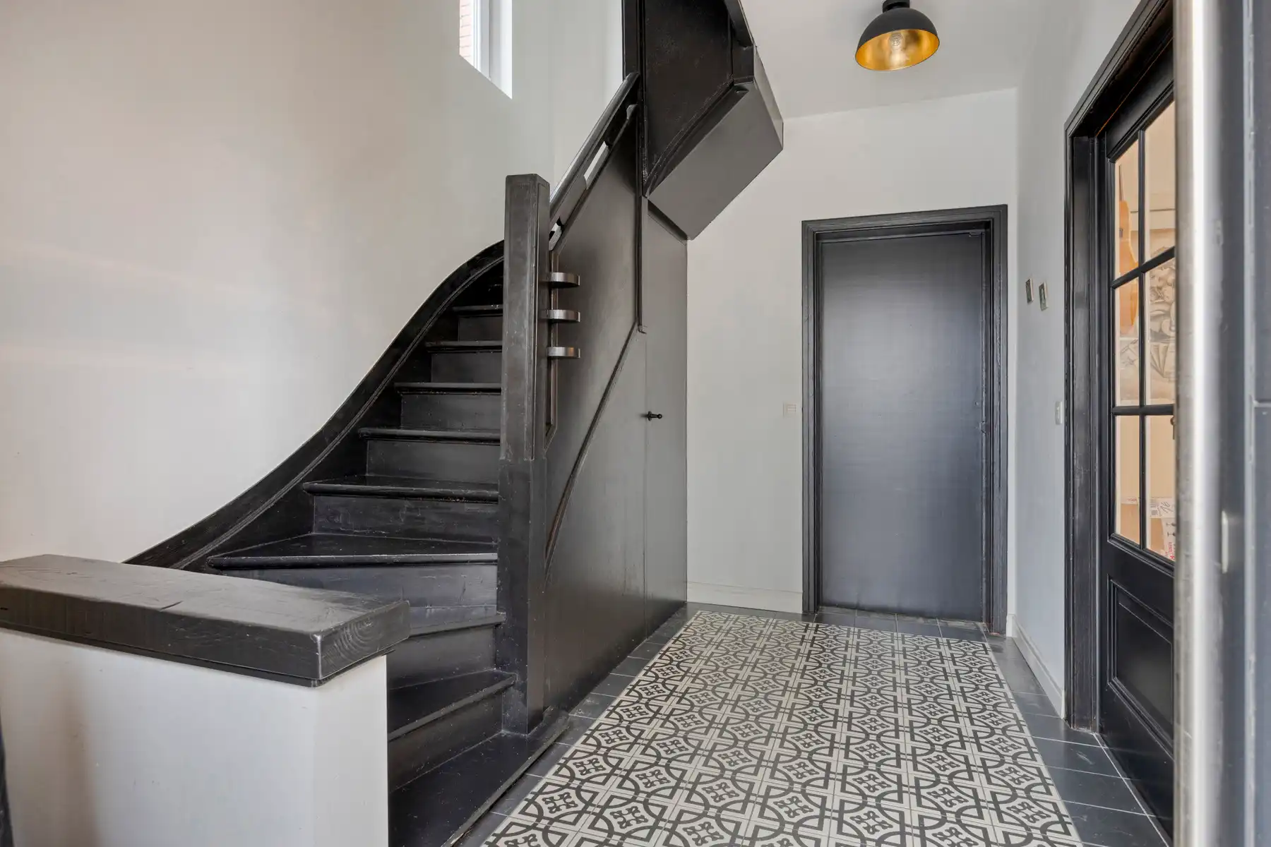 Leemans Immobiliën stelt u deze halfopen en bijzonder gezellige woning voor, gelegen in het hart van Merchtem.  foto 4