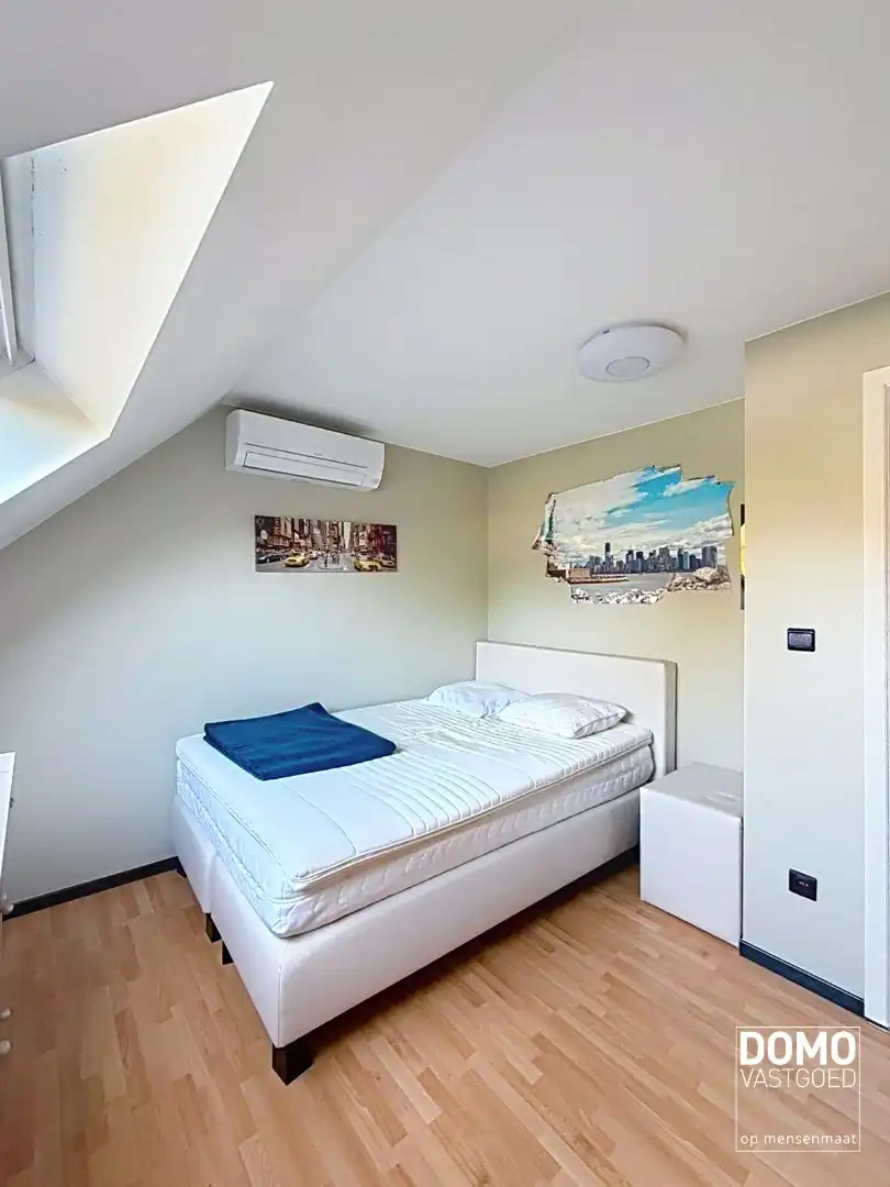 Warme gezinswoning met prachtige tuin in hartje Kortessem foto 10