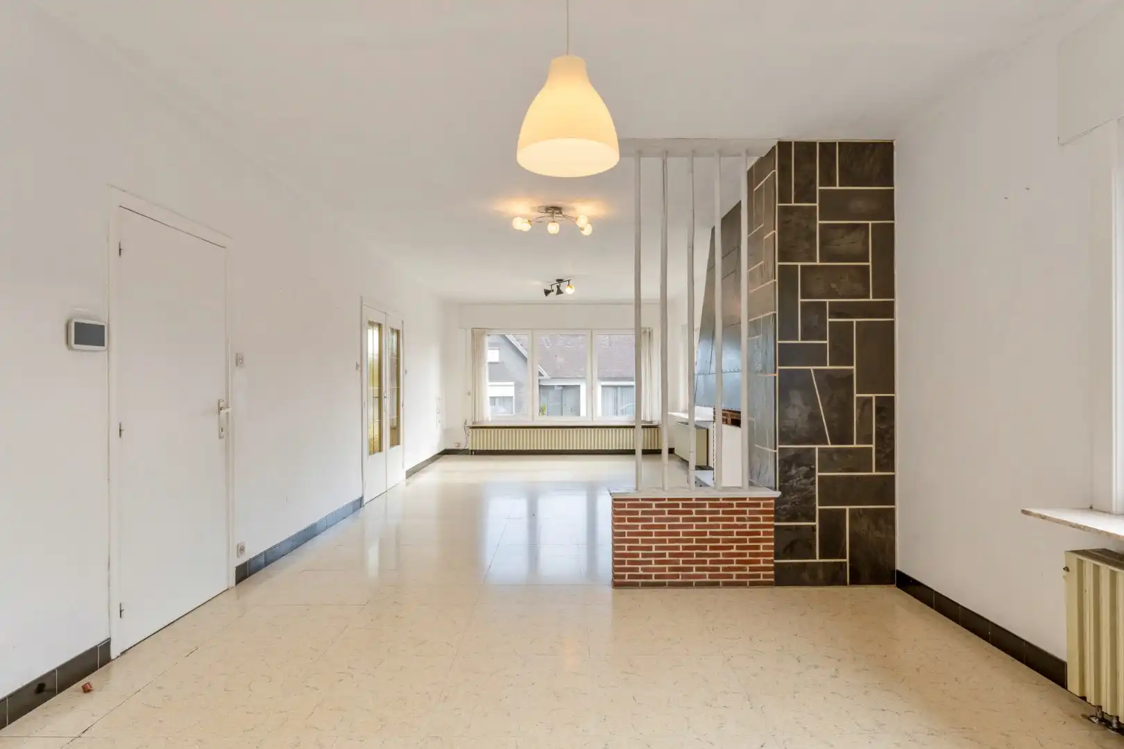 Ruime gezinswoning op een perceel van 9a60ca met 4 slaapkamers en een inpandige garage nabij het centrum van Opoeteren foto 7