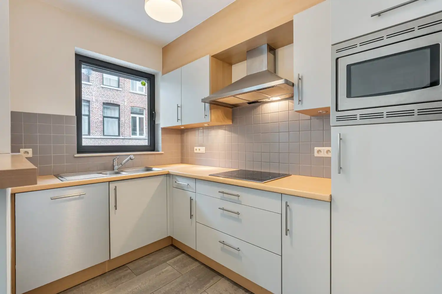 Centraal gelegen en energiezuinig(B-label) appartement met 2 slaapkamers, een terras en een kelder nabij het UZ Gasthuisberg te Leuven! foto 10