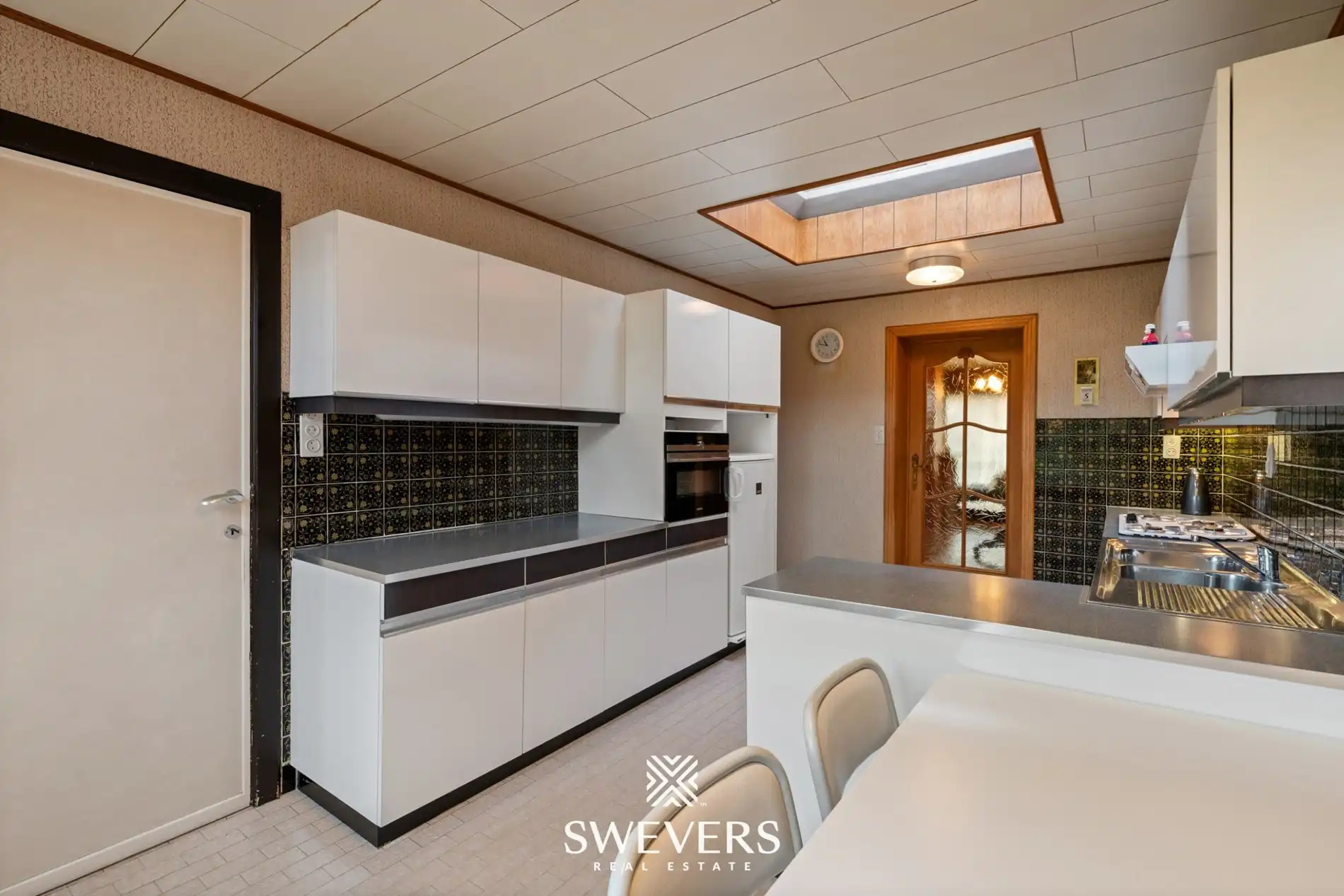 Woning met uitzonderlijk renovatiepotentieel op ruim en groen perceel nabij Zonhoven centrum foto 13