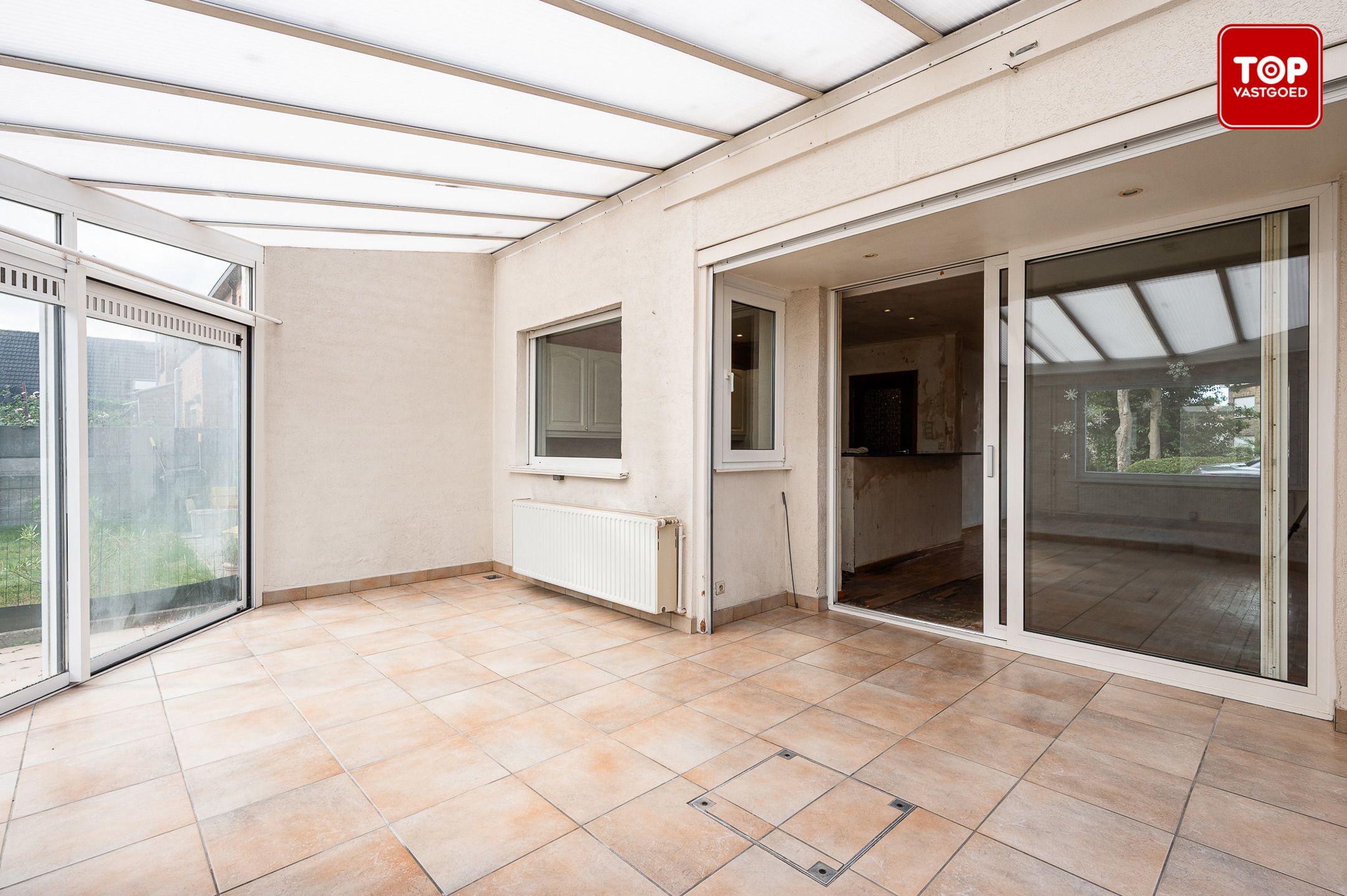 Te renoveren half open woning met tuin en garage. foto 11