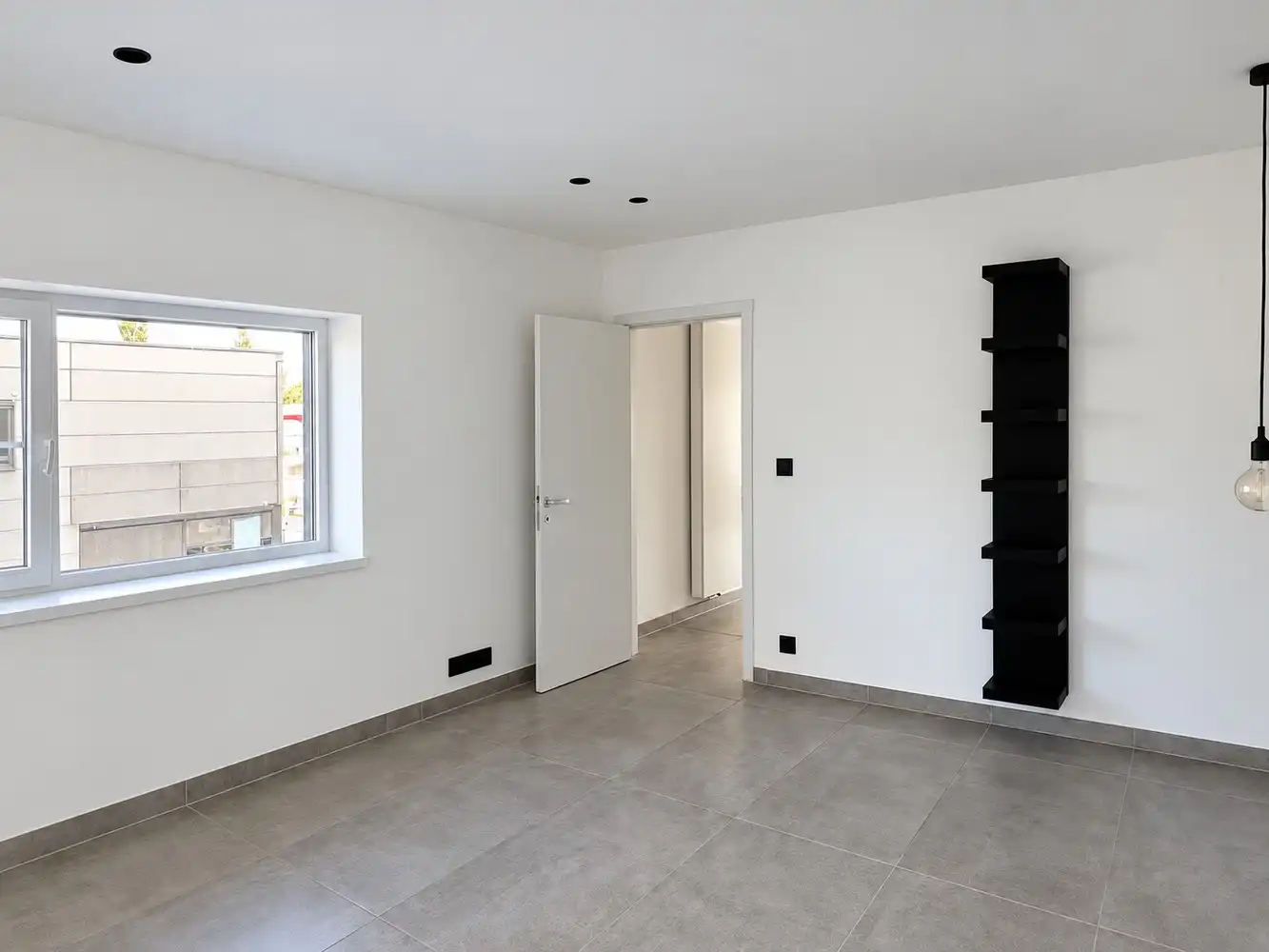 Ruim triplexappartement met vier slaapkamers, ruim terras en twee autostaanplaatsen foto 12
