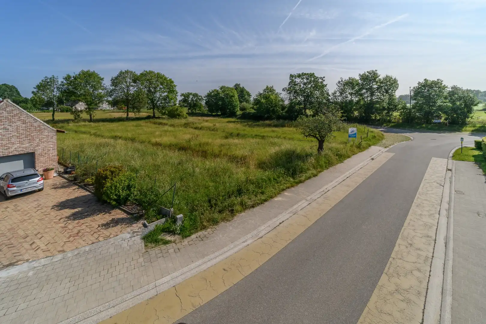 Bouwgrond voor halfopen bebouwing te Sint-Lievens-Houtem foto 2