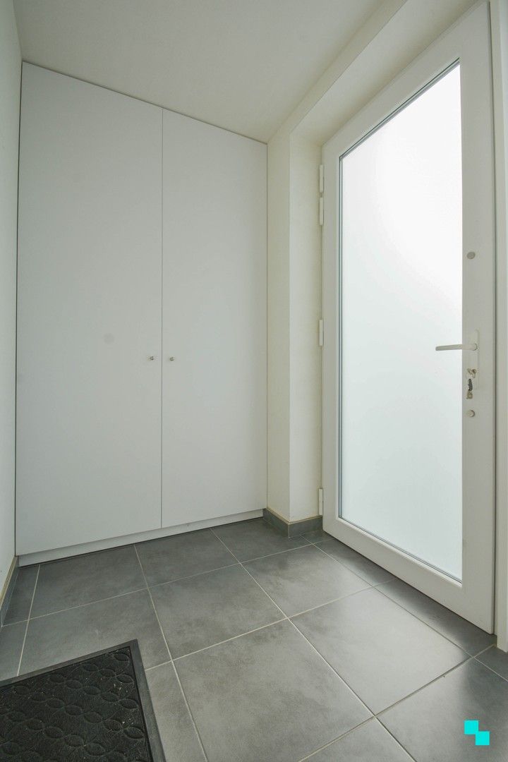 Energiezuinig  tweeslaapkamerappartement met tuin foto 3