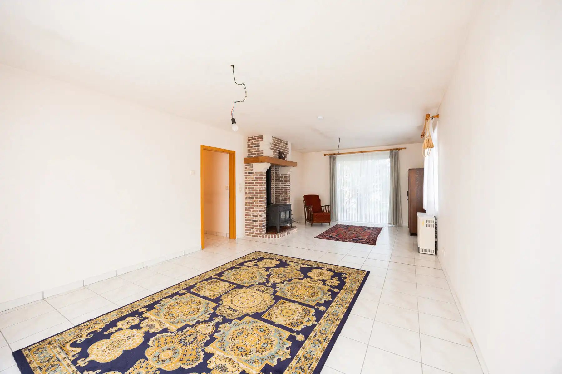 Gelijkvloerse open bebouwing met onderhoudsvriendelijke tuin foto 14