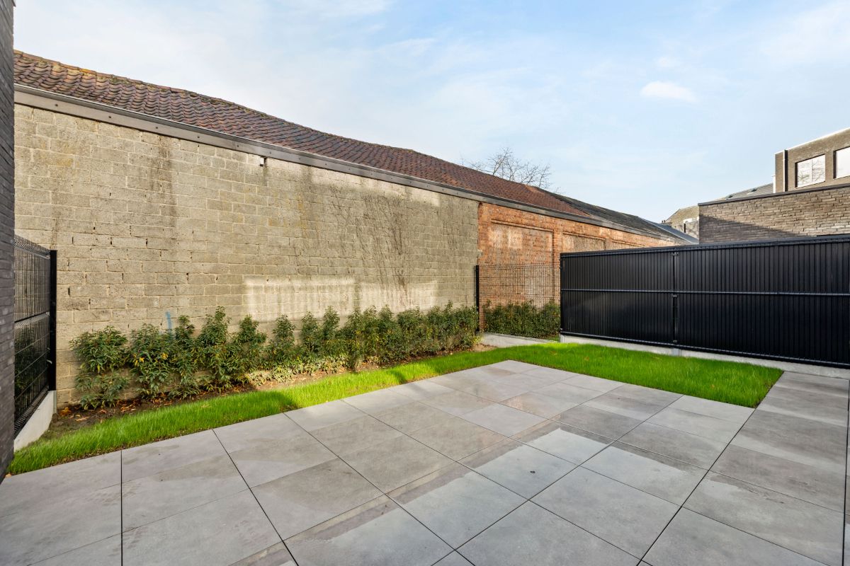 Exclusief BEN-nieuwbouwappartement in het hart van Oudegem – luxueus wonen aan 6% btw (onder voorwaarden) foto {{pictureIndex}}