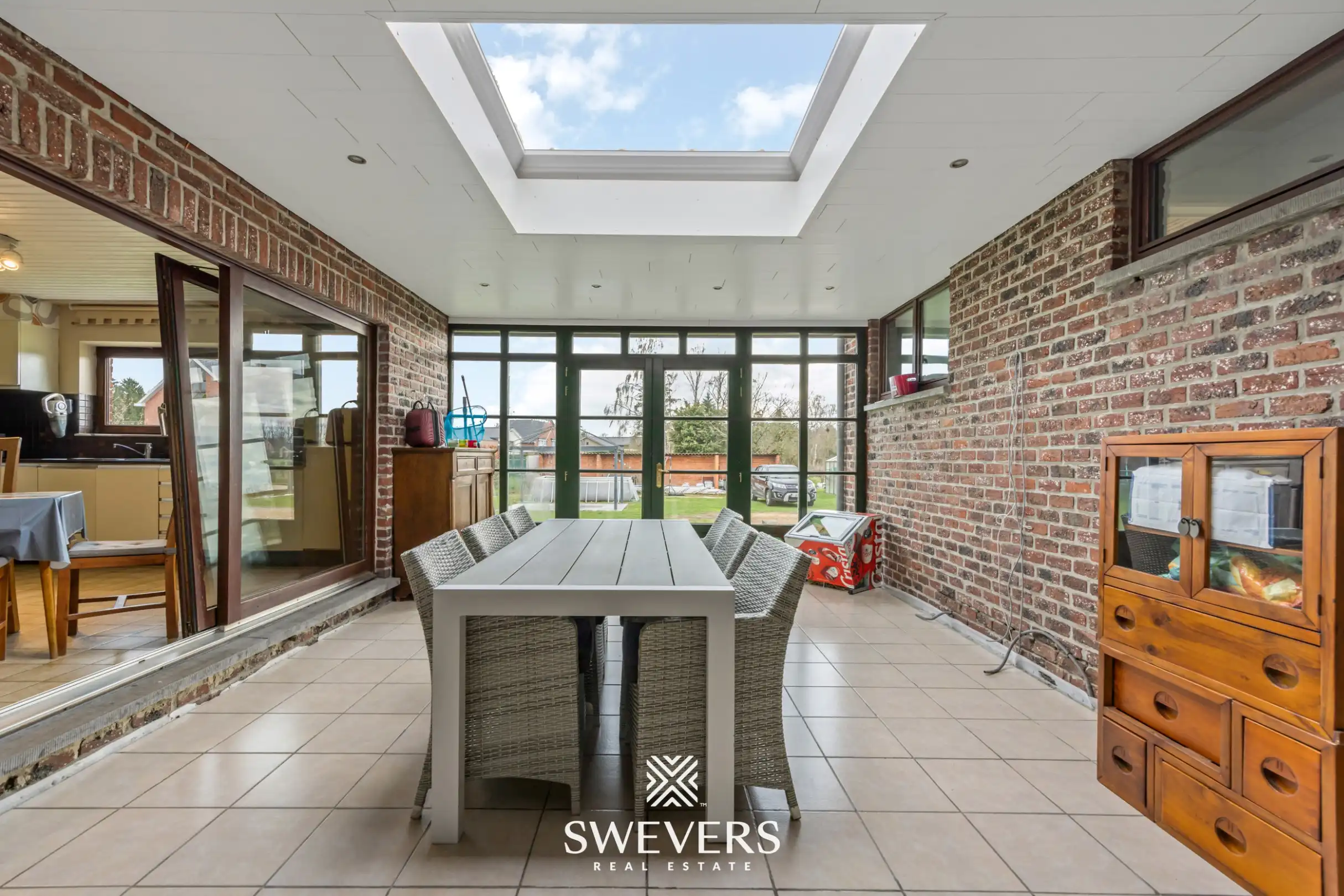 Zonnige woning met ruime zuid georiënteerde tuin in het rustige Diepenbeek foto 15