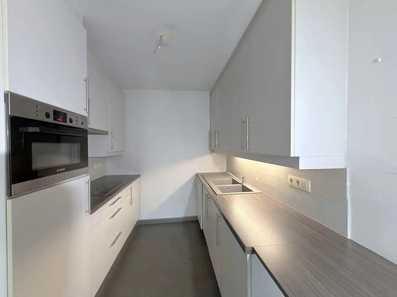 Duplex appartement met kelder en overdekte autostaanplaats foto 4