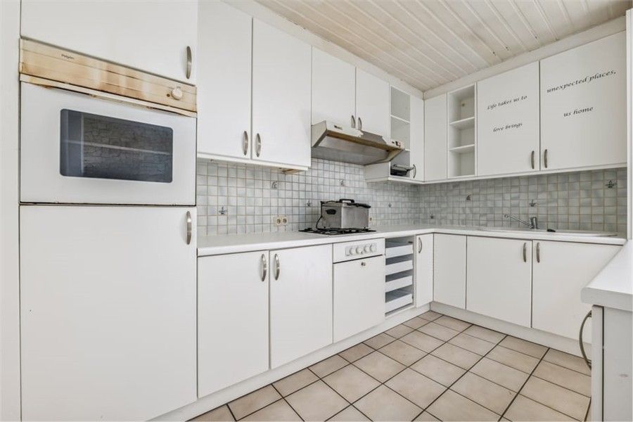 KNUSSE GEZINSWONING MET GEZELLIGE STADSTUIN IN HASSELT foto 12