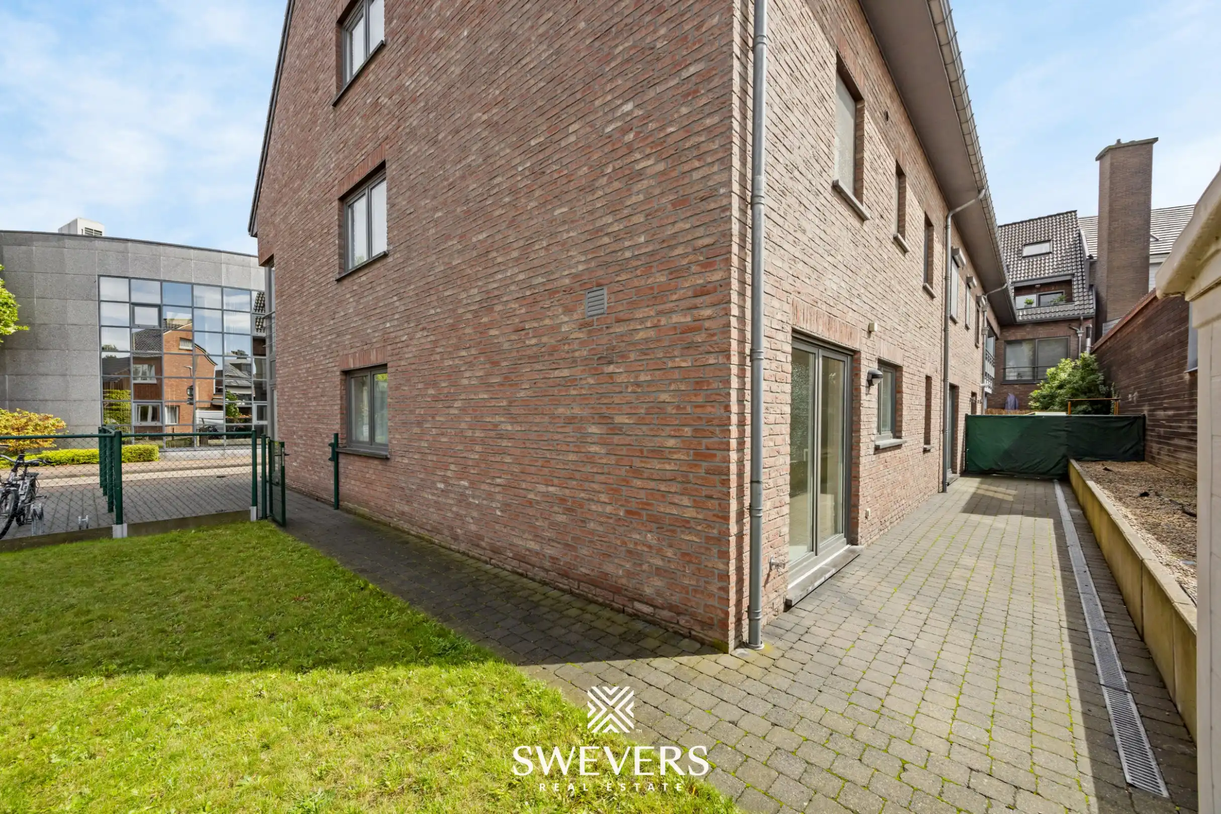 Uitstekend gelegen gelijkvloers appartement met 2 slaapkamers en private tuin foto 24