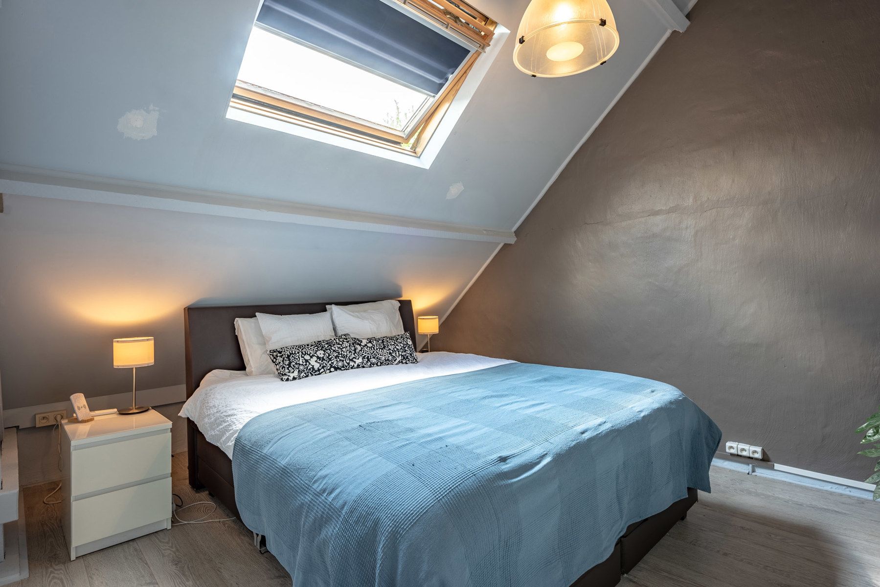 Instapklare bel-etagewoning met 2 slaapkamers, tuin en garagebox! foto 13