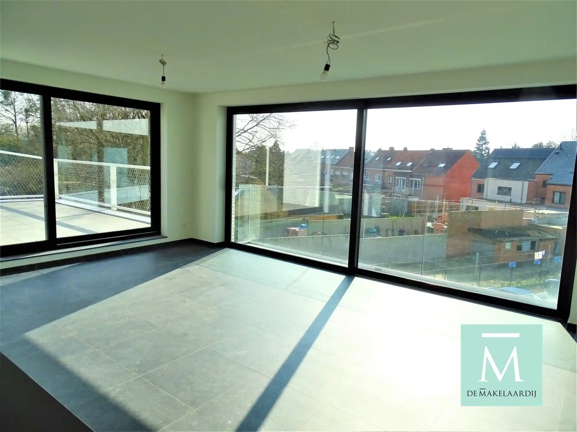 Aangenaam appartement, 2 slaapkamers, ruim terras (75m²), kelder en autostaanplaats foto 2