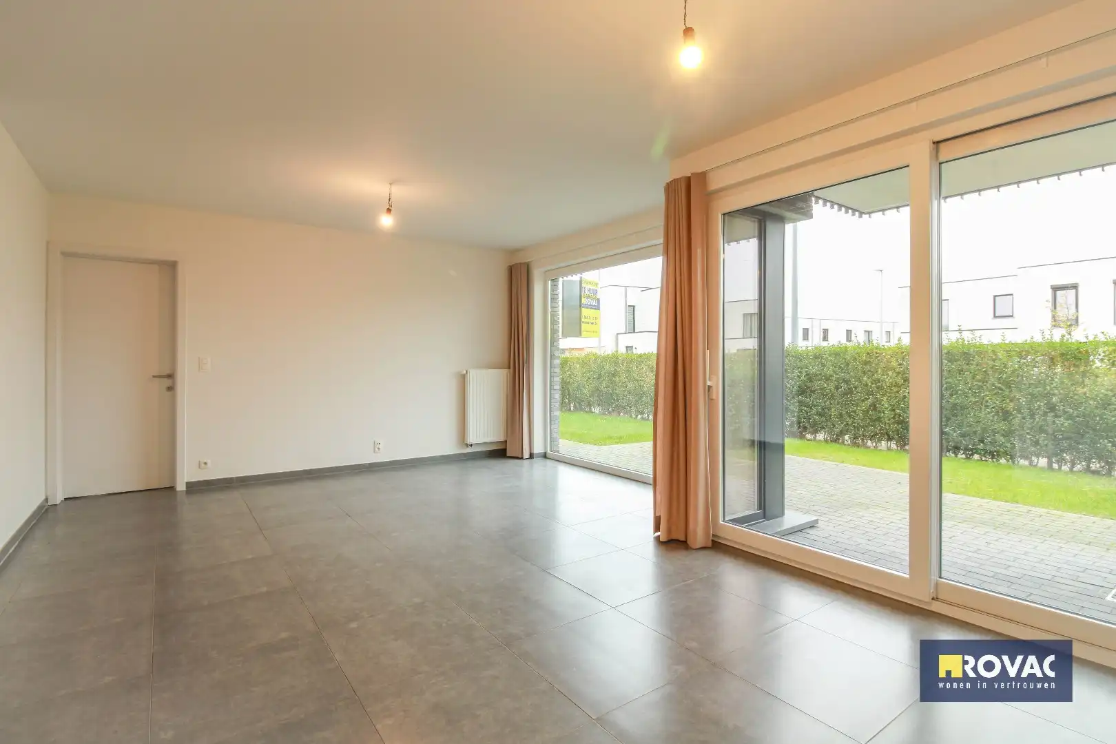 Gelijkvloers appartement met tuin en garage! foto 4