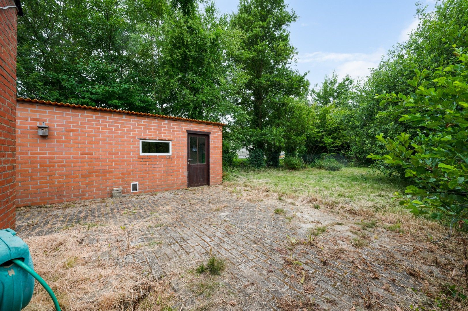 Te renoveren woning met tuin en garage in Wolfsdonk! foto 21