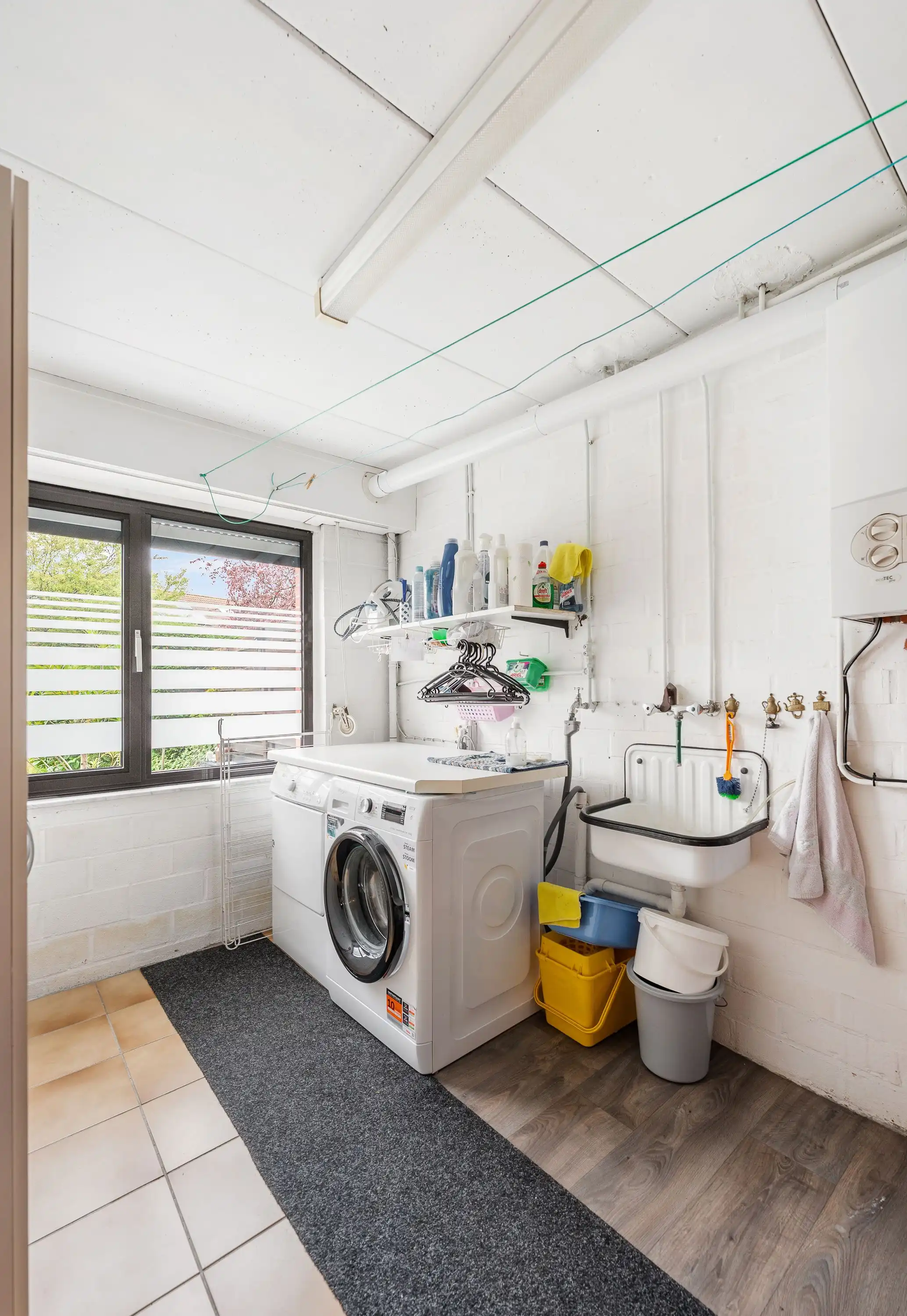 Een praktische gezinswoning met verrassend veel ruimte in Merksem! foto 15