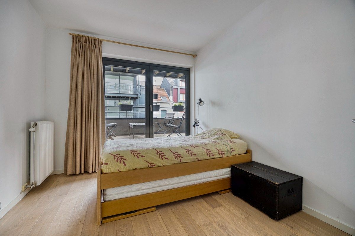 Appartement 3 slaapkamers met staanplaats nabij het centrum van Jette foto 12