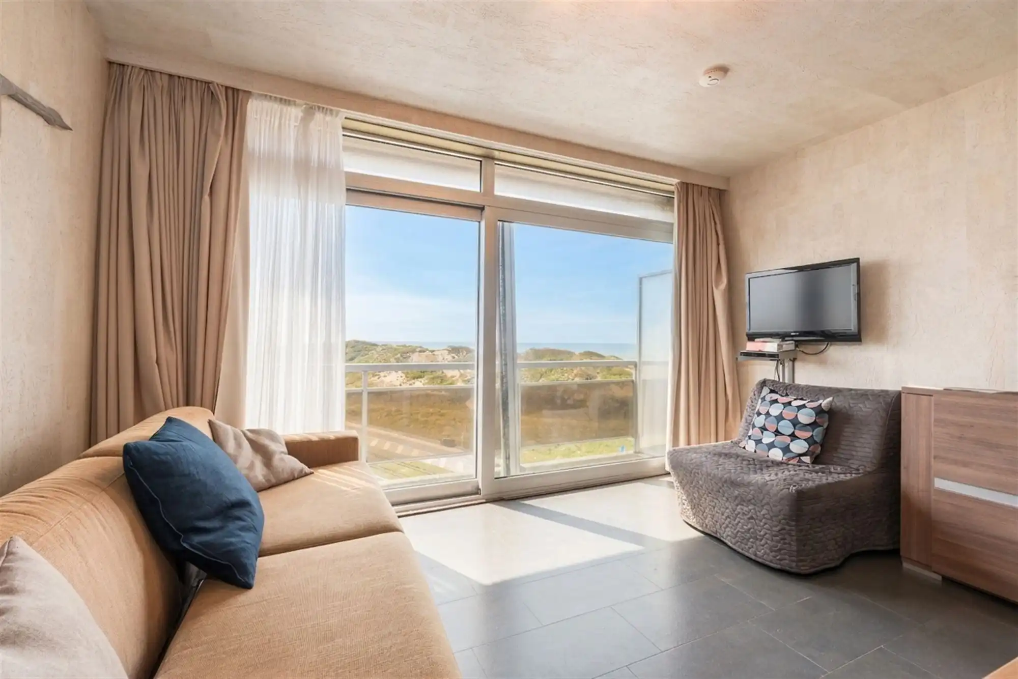 Instapklare studio met adembenemend uitzicht op zee en duinen! foto 4