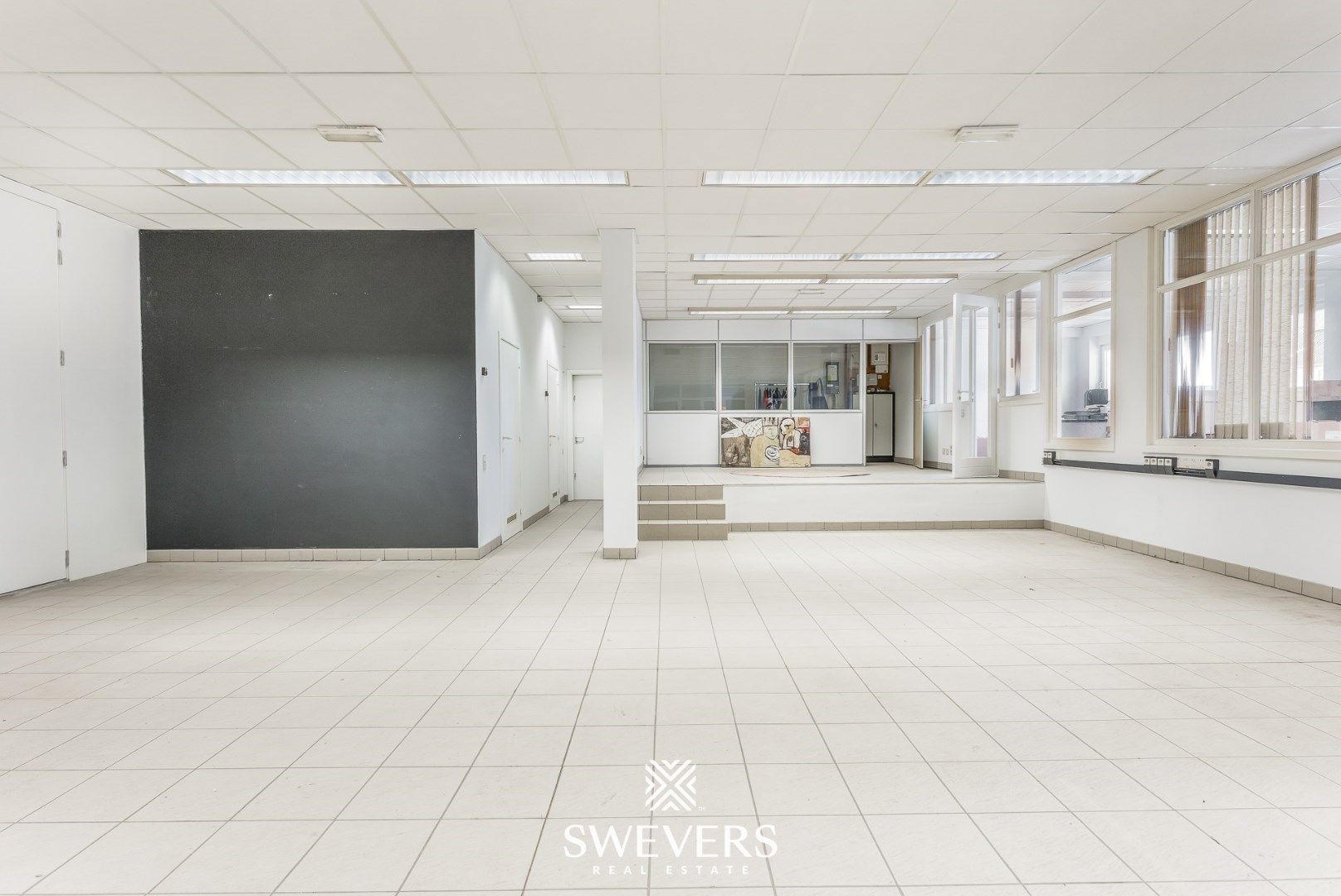 Handelspand met ruime woning in hartje Lummen – een unieke opportuniteit foto 30