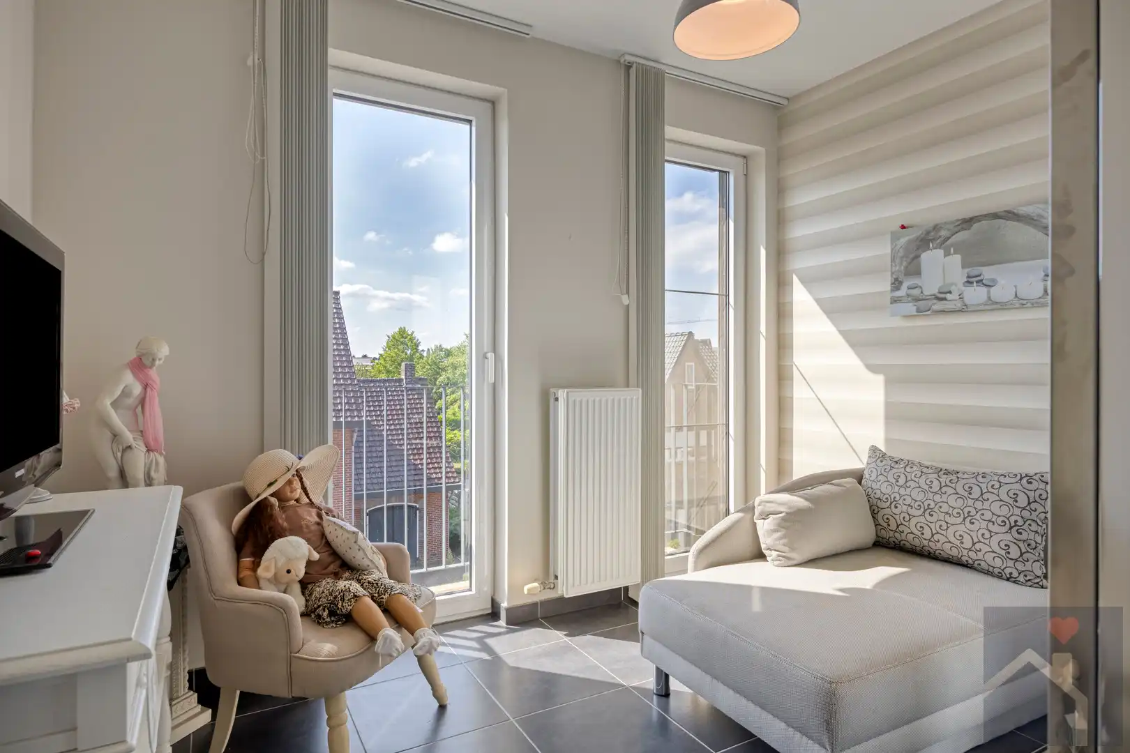 Instapklaar 2-slaapkamerappartement met terras, parking & berging in centrum Overpelt foto 18