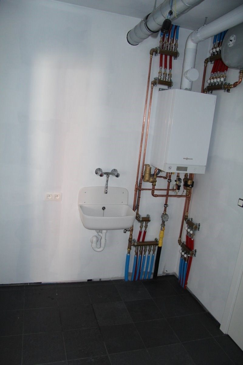 Uiterst ruime, recente woning met 3 slk, garage en tuin in centrum Berlare foto 7