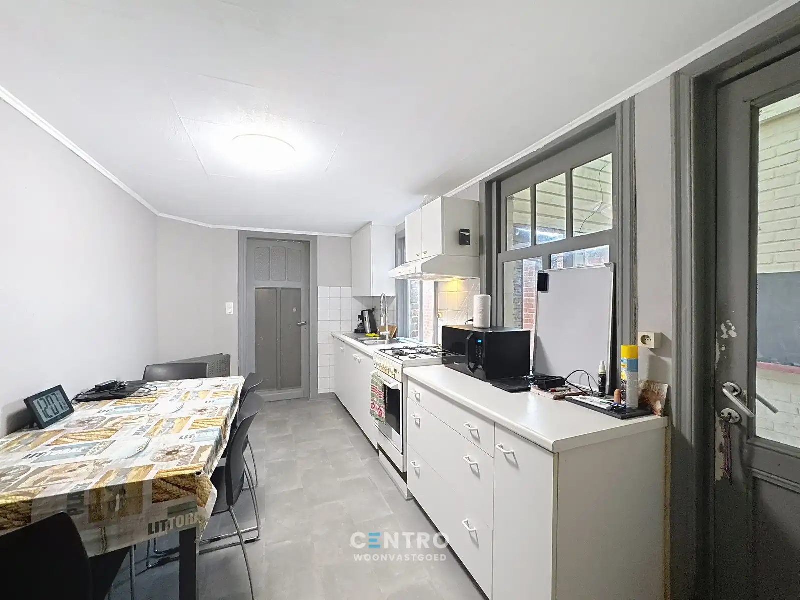 Op te frissen woning met 4 slpks én ZUIDger. tuin te Assebroek! foto 6