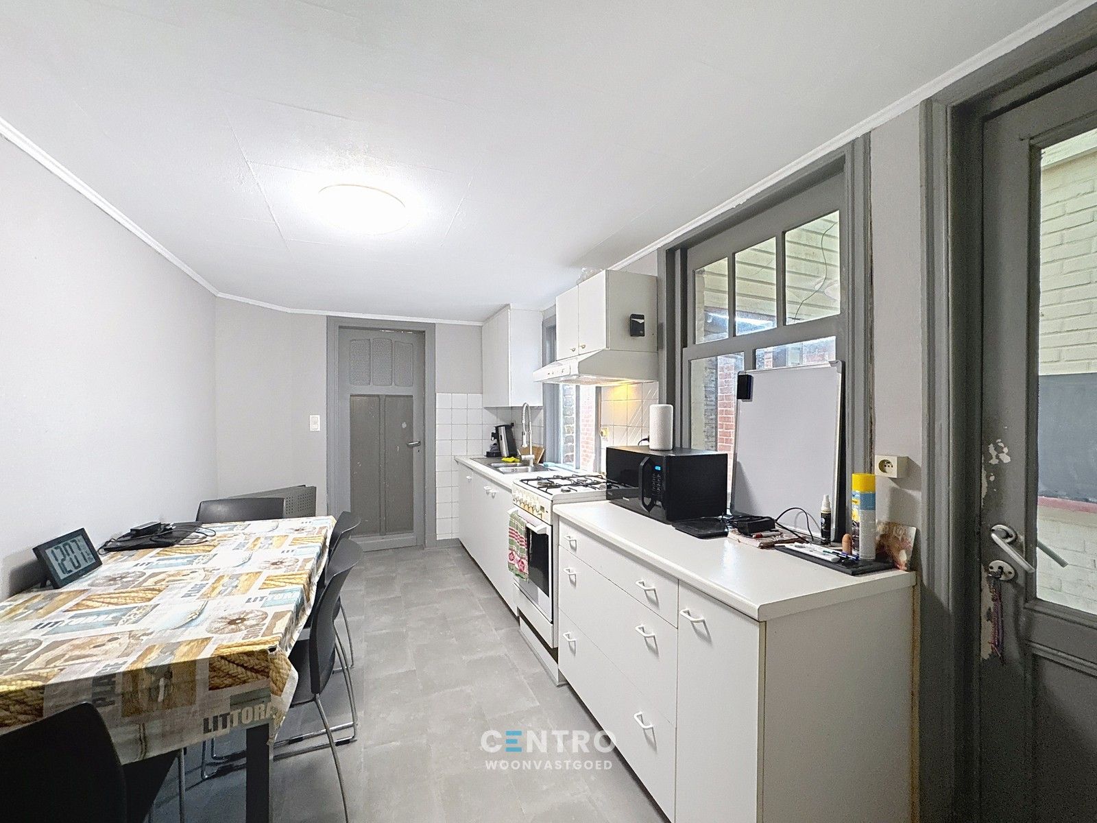 Op te frissen woning met 4 slpks én ZUIDger. tuin te Assebroek! foto 6