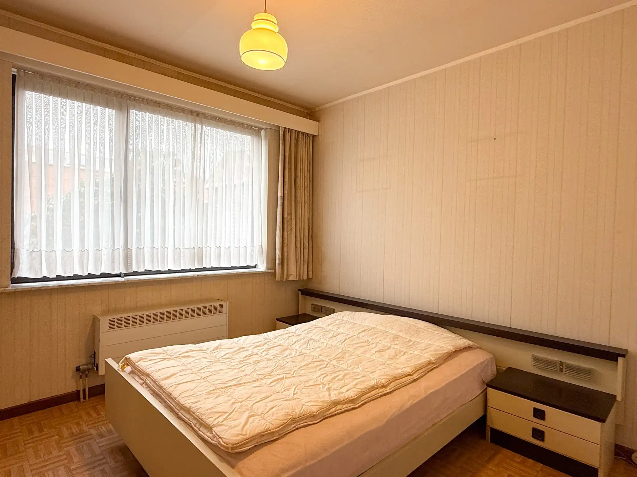 Ruim gelijkvloers appartement met tuin, garage en 3 kamers foto 10