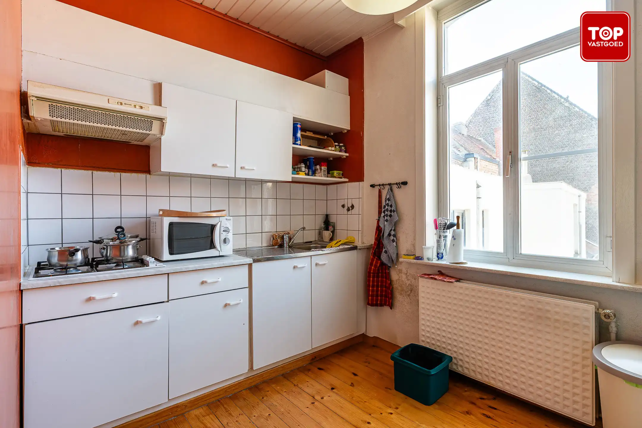 Woning met handelsgelijkvloers op een commercieel interessante ligging.  foto 17