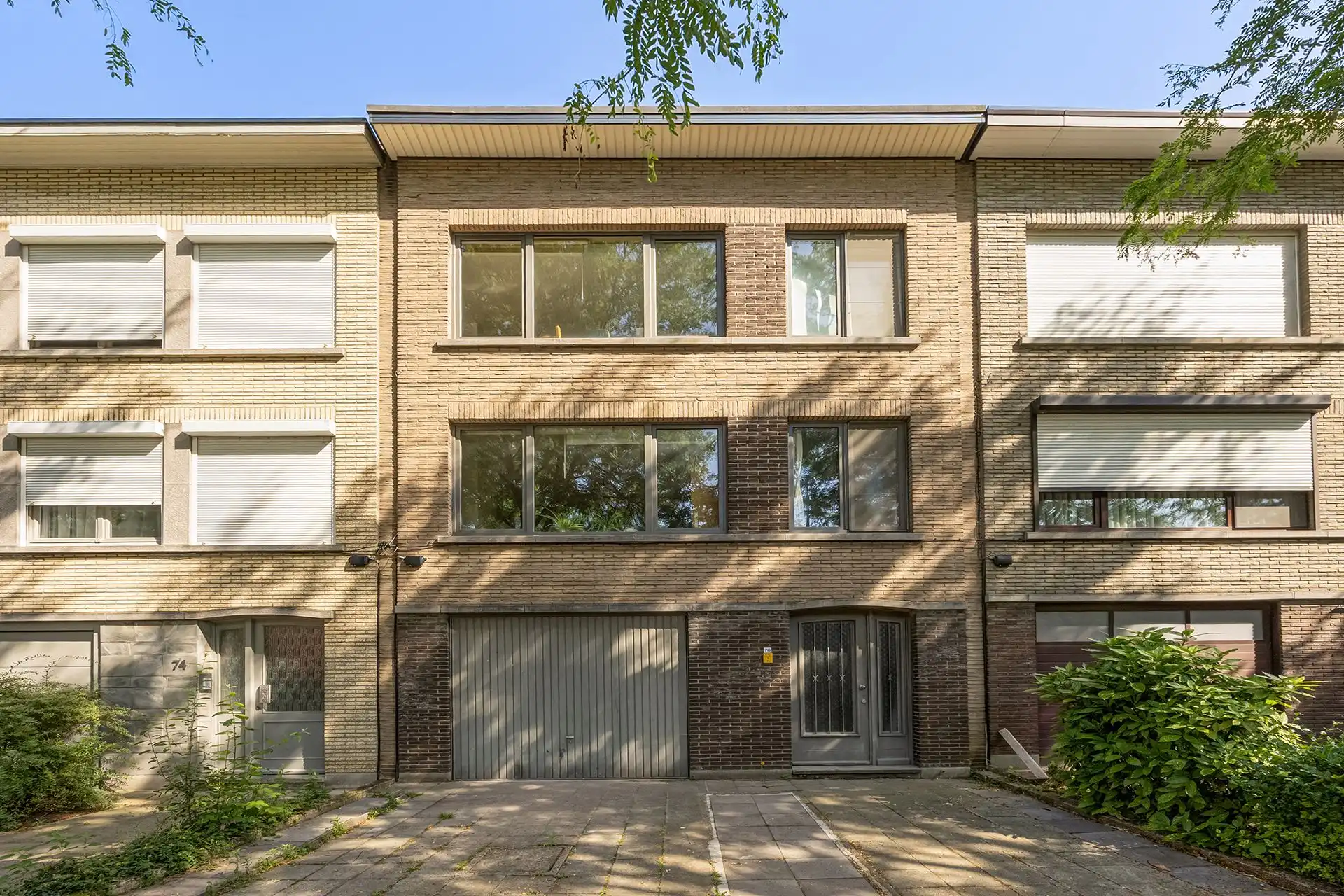 Gebouw met 2 appartementen, tuin en garage foto {{pictureIndex}}